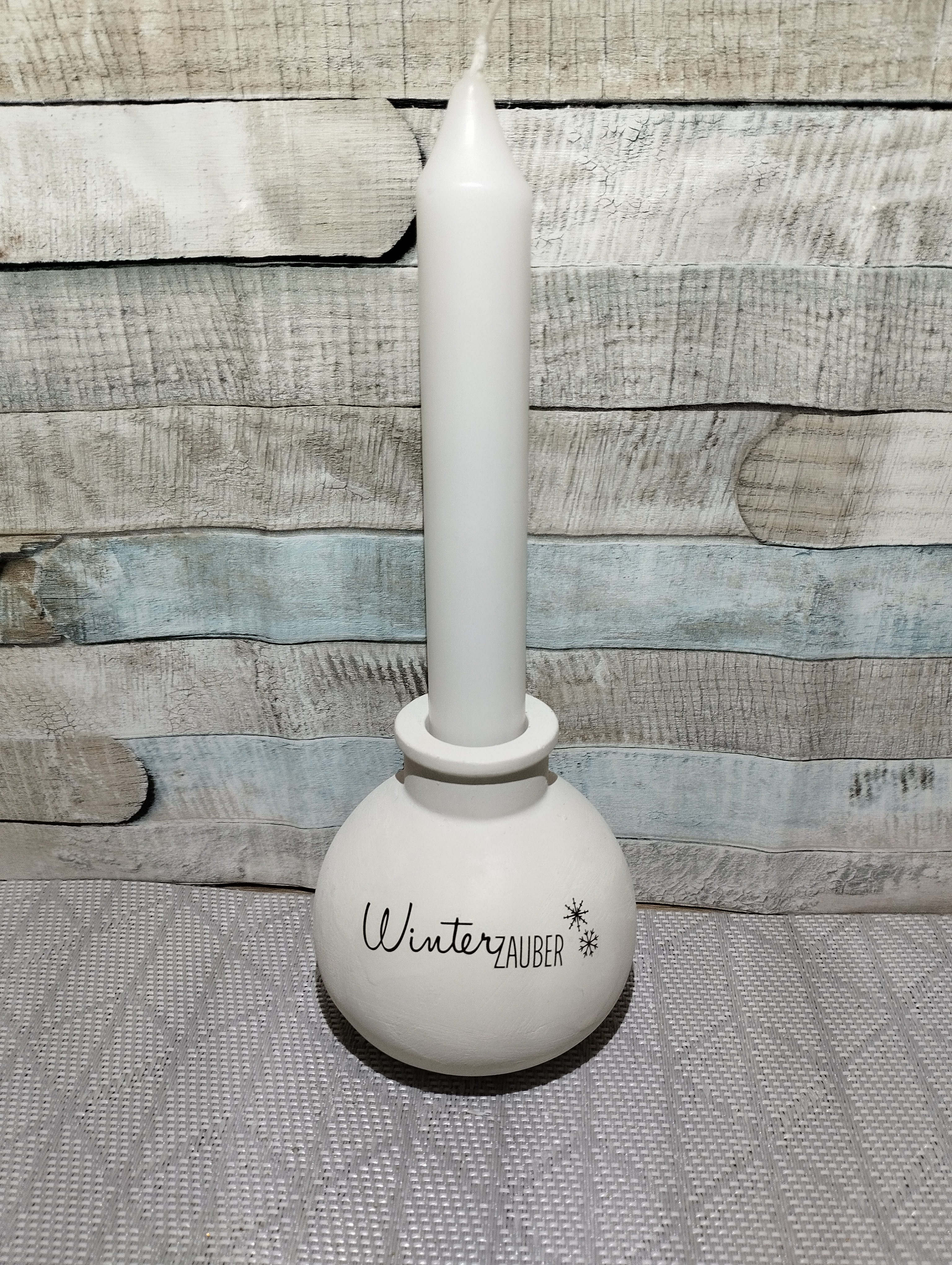 Weihnachtliche Kerzendekoration