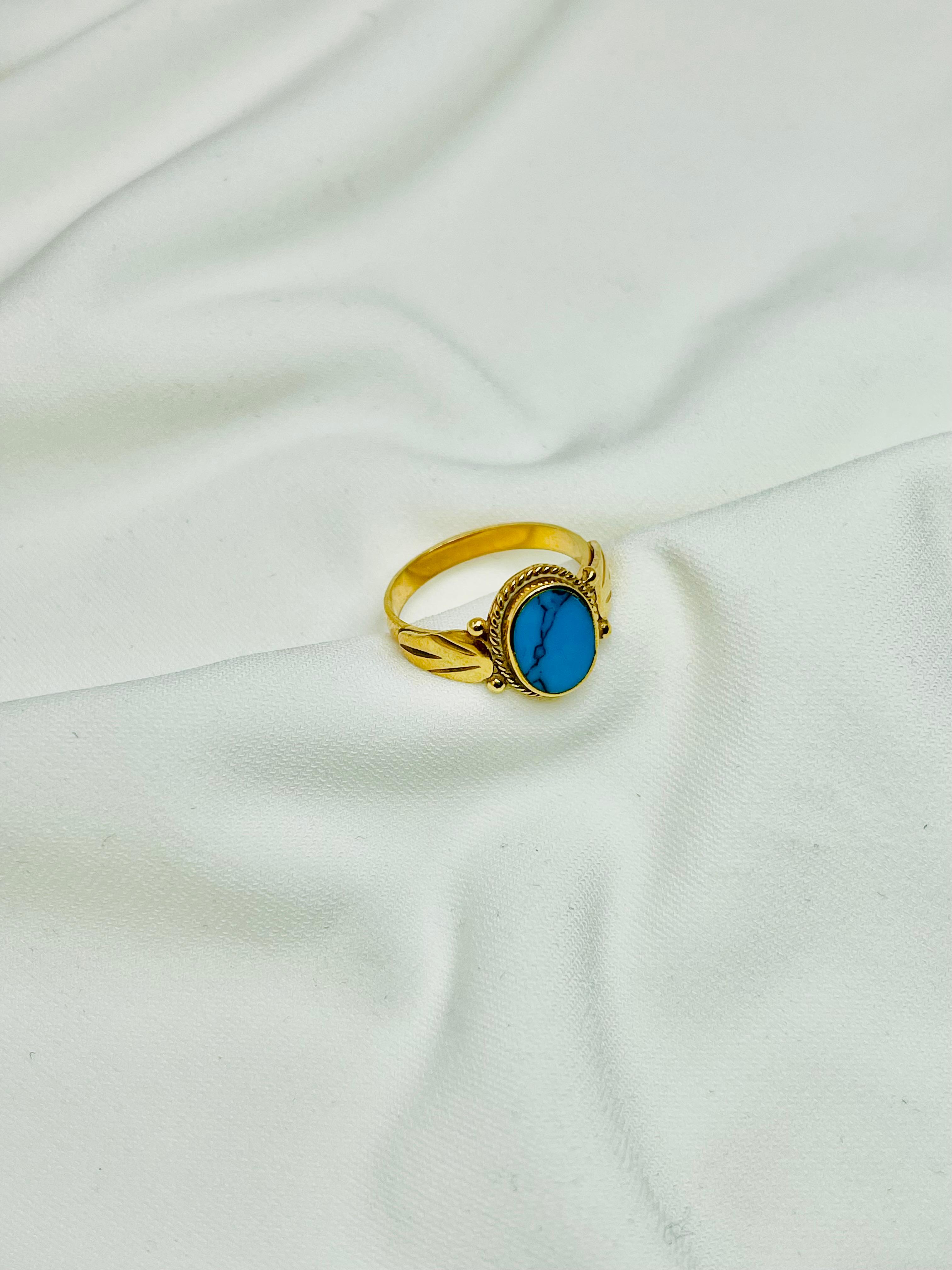 Gold Ring with Blue Gemstone