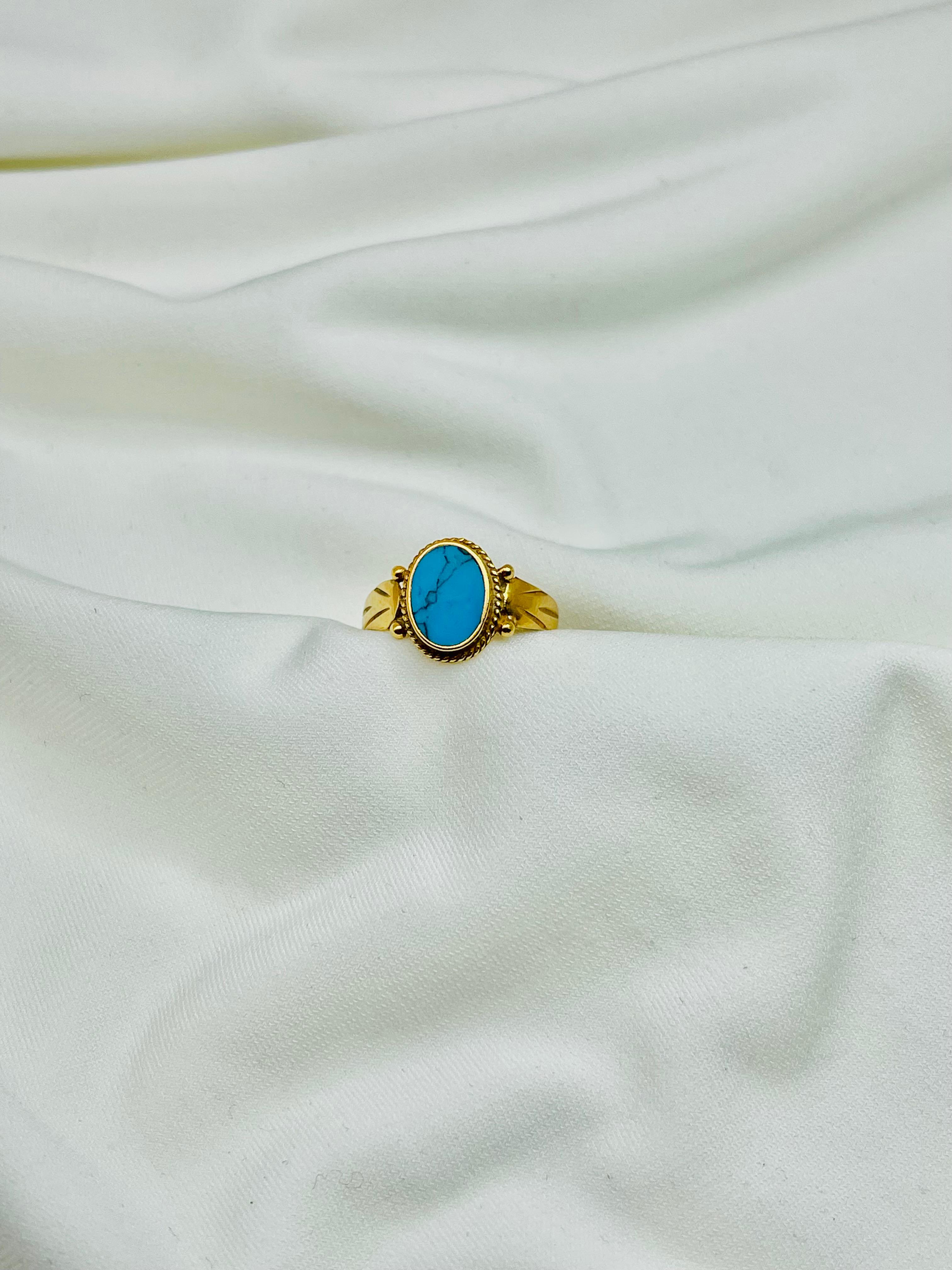 Gold Ring with Blue Gemstone