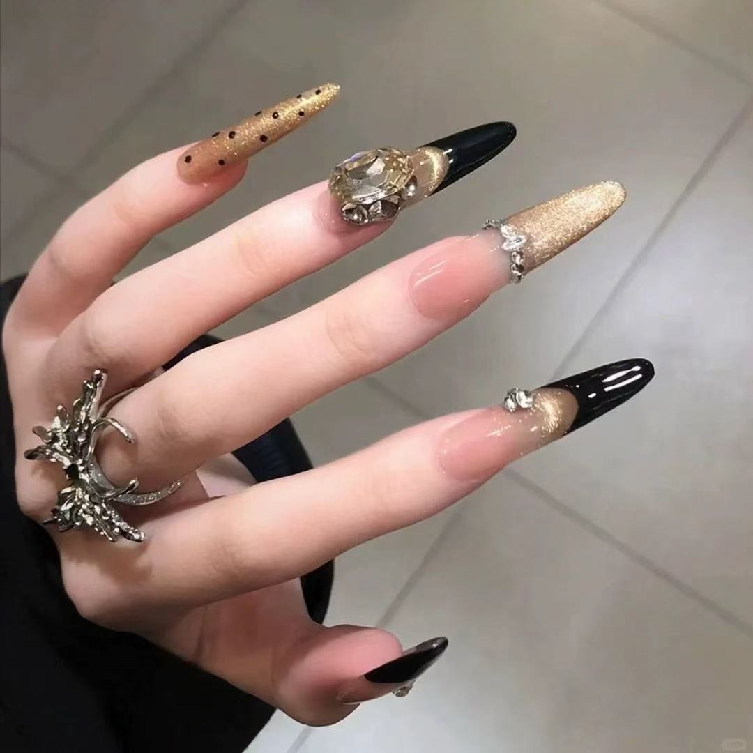 Luxurious handmade nail polish with black gold French polka dot cat's eye glittering champagne diamonds, elegant rich manicure