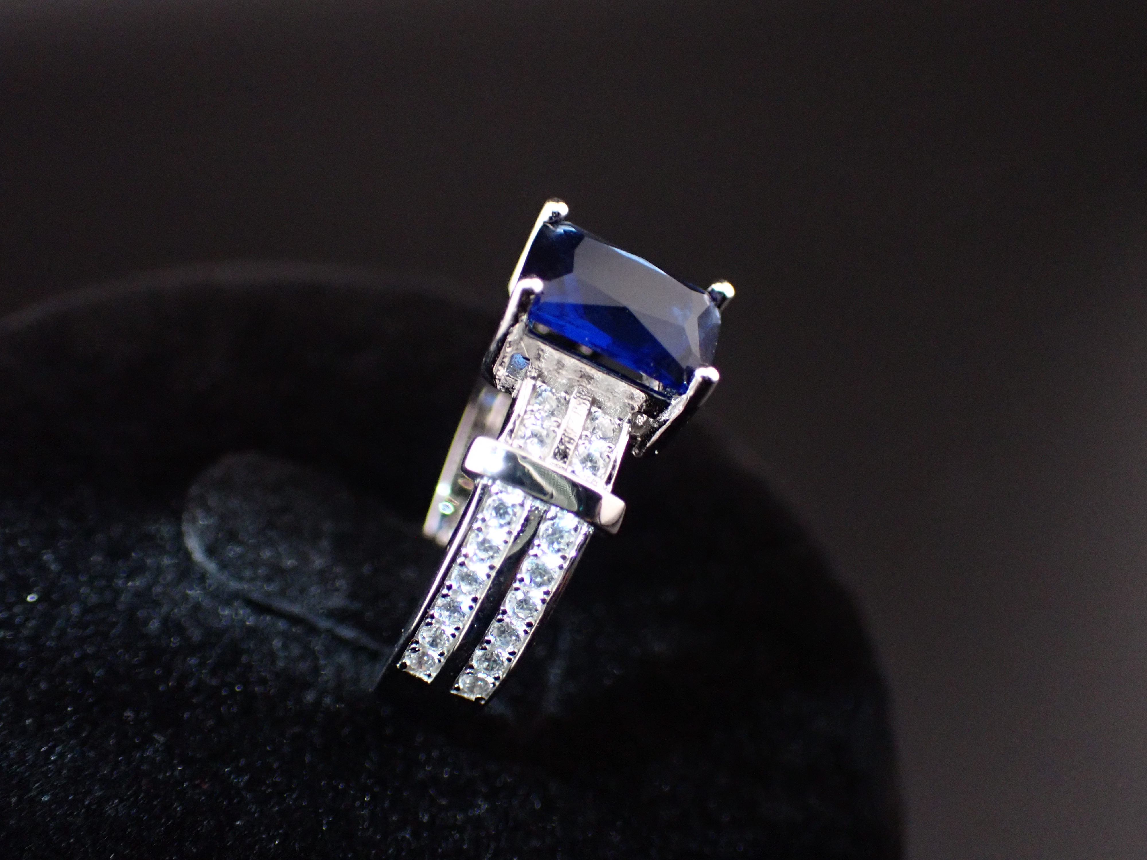 Blue Emerald Cut and Double Shoulder Ring