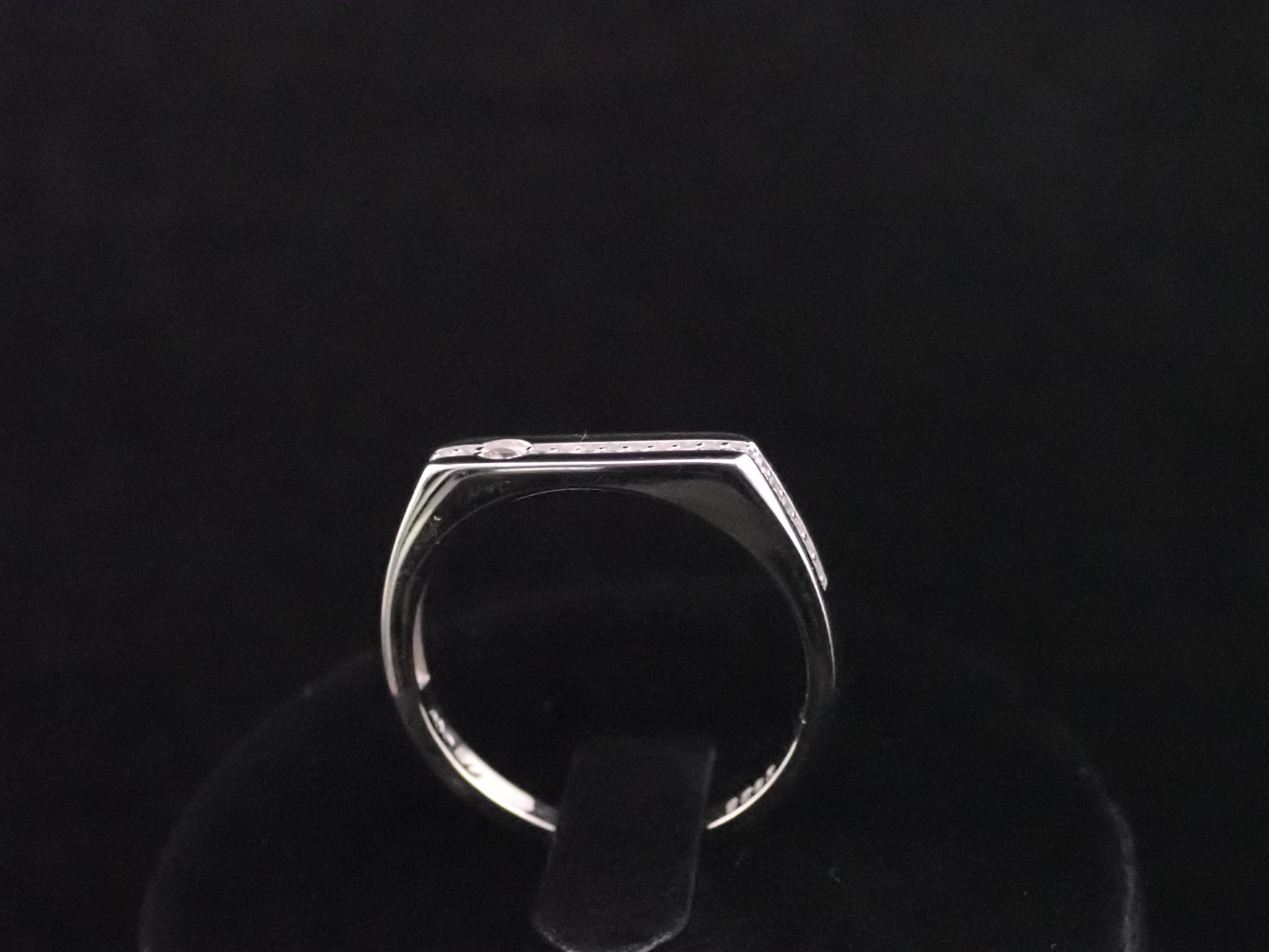 Silver Ring with Embedded Stones