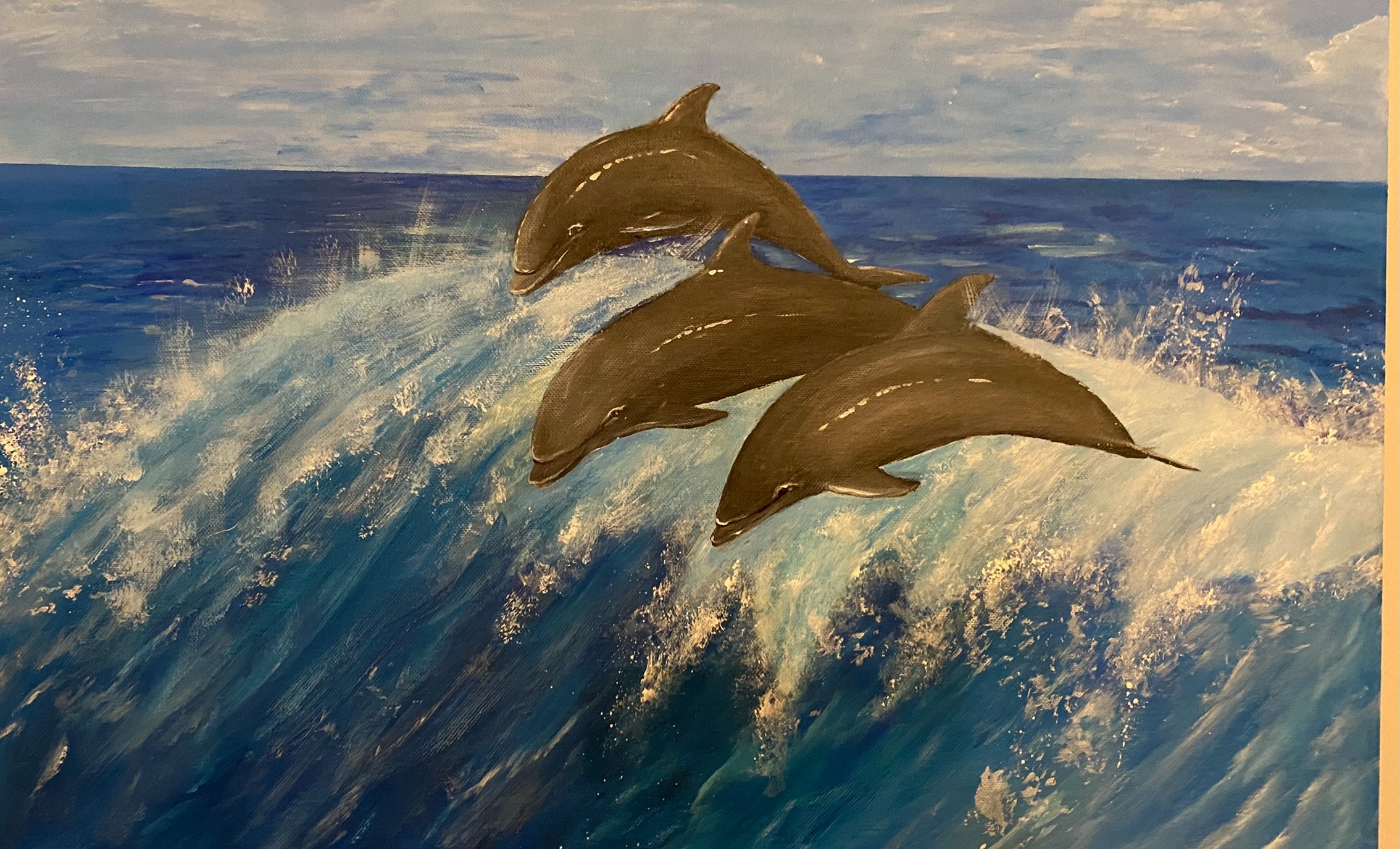 Dolphins jumping over waves in Acrylics