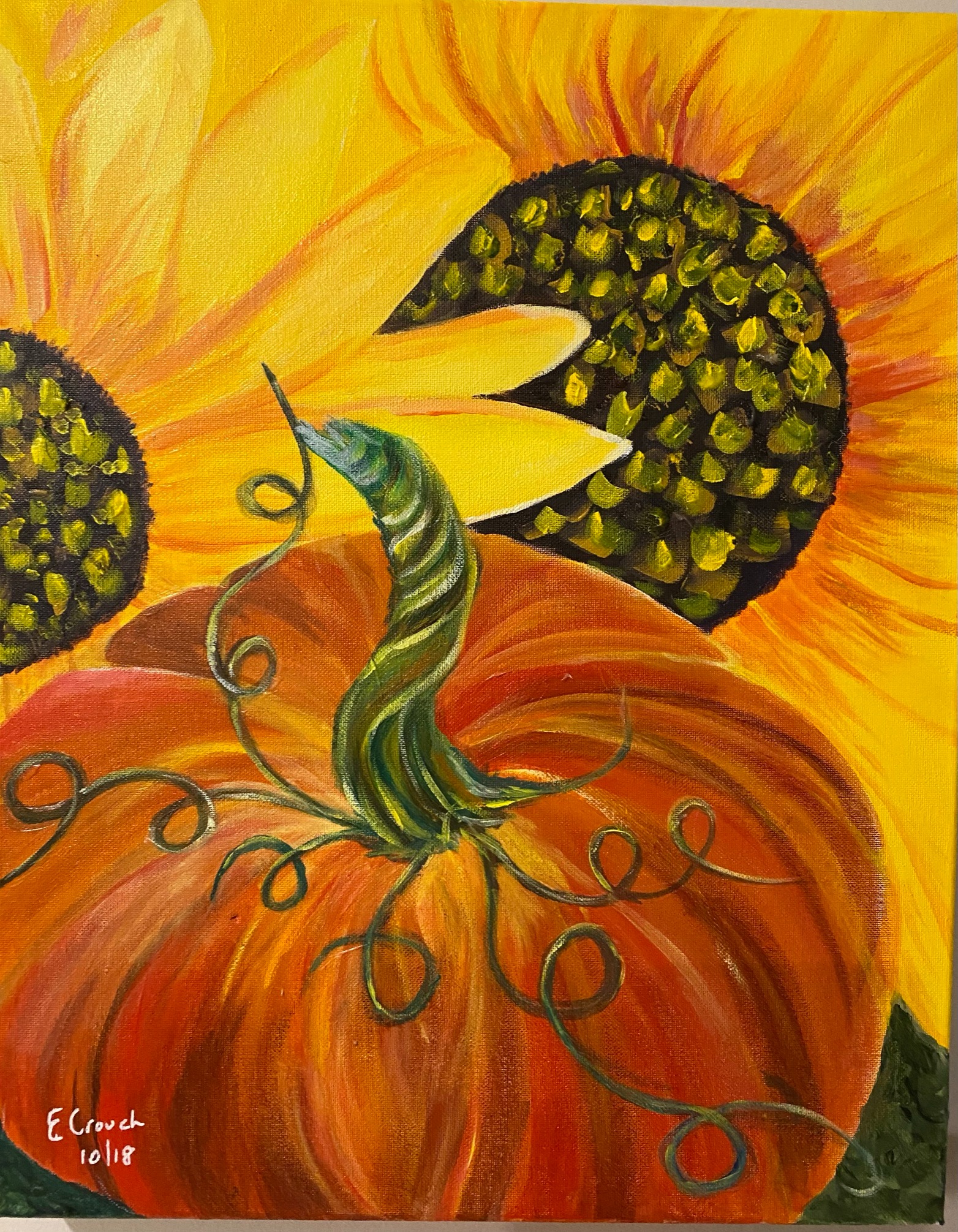 Pumpkin in front of sunflowers