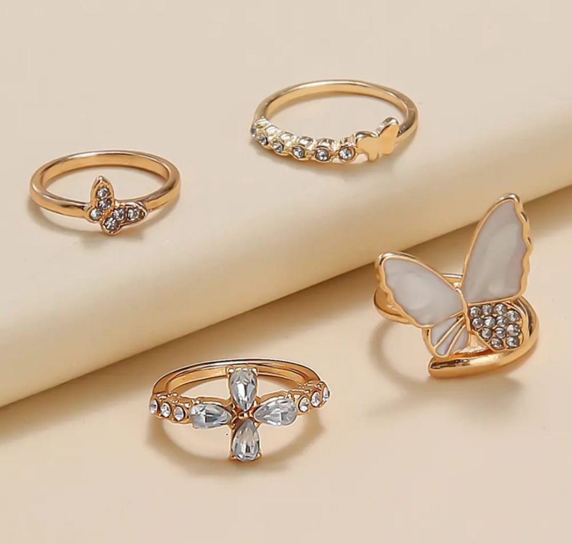 Golden Butterfly Charm Ring Set – 4 Piece Elegant Crystal Collection