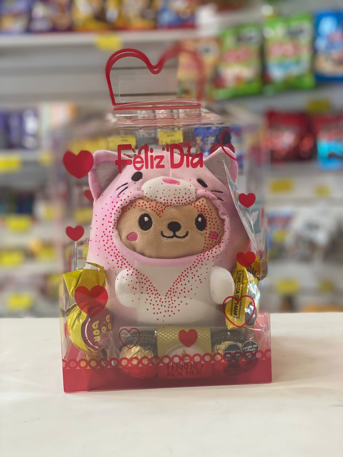 Peluche en caja con golosinas