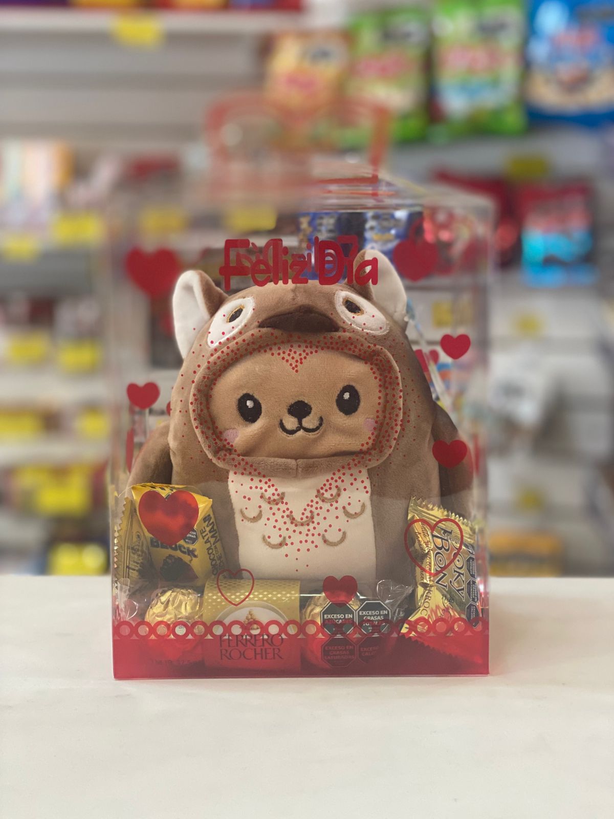 Peluche en caja con golosinas