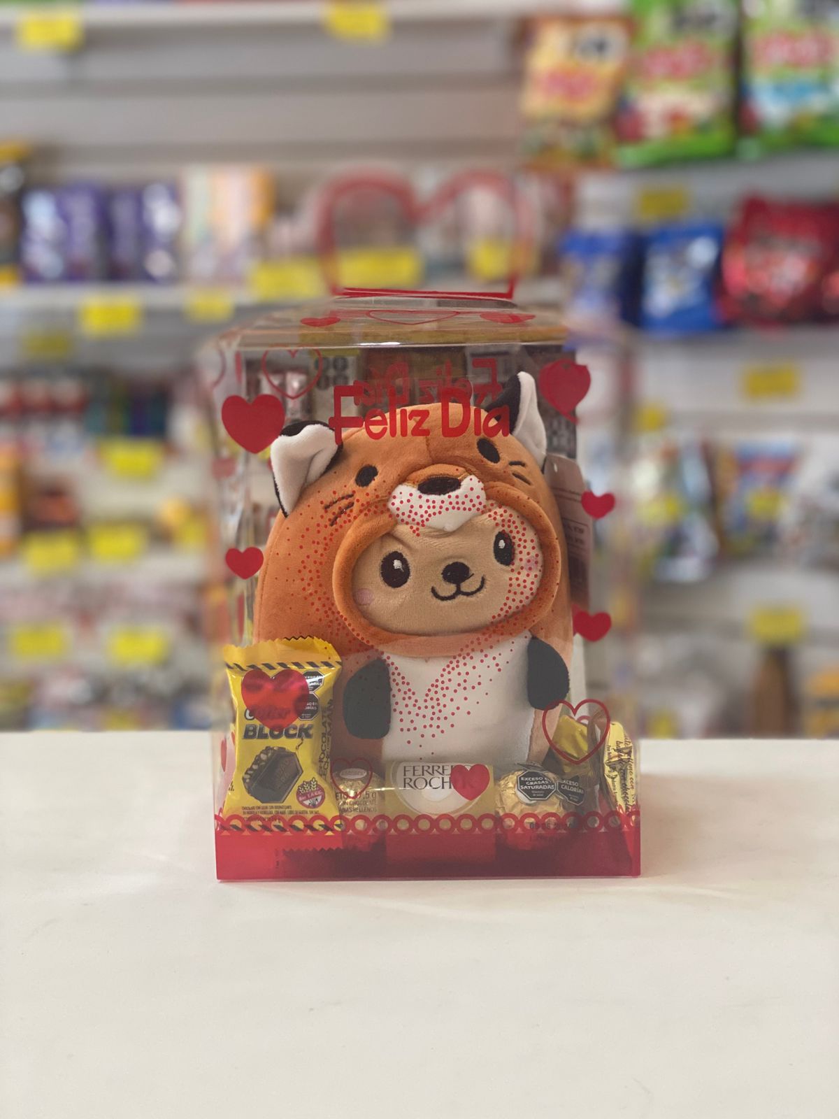 Peluche en caja con golosinas