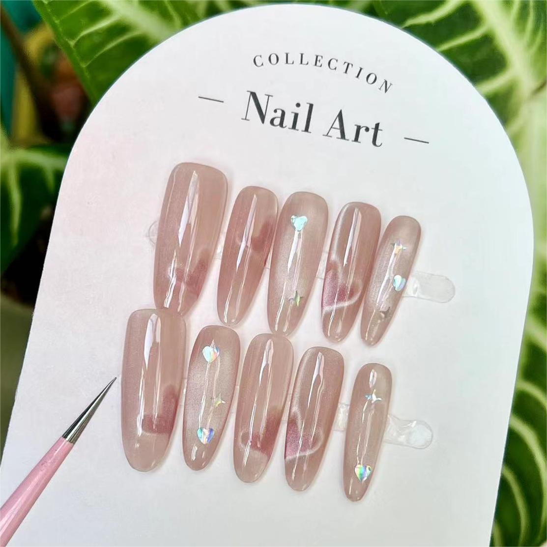 Glossy Pink Press-On Nails with Hearts and Stars