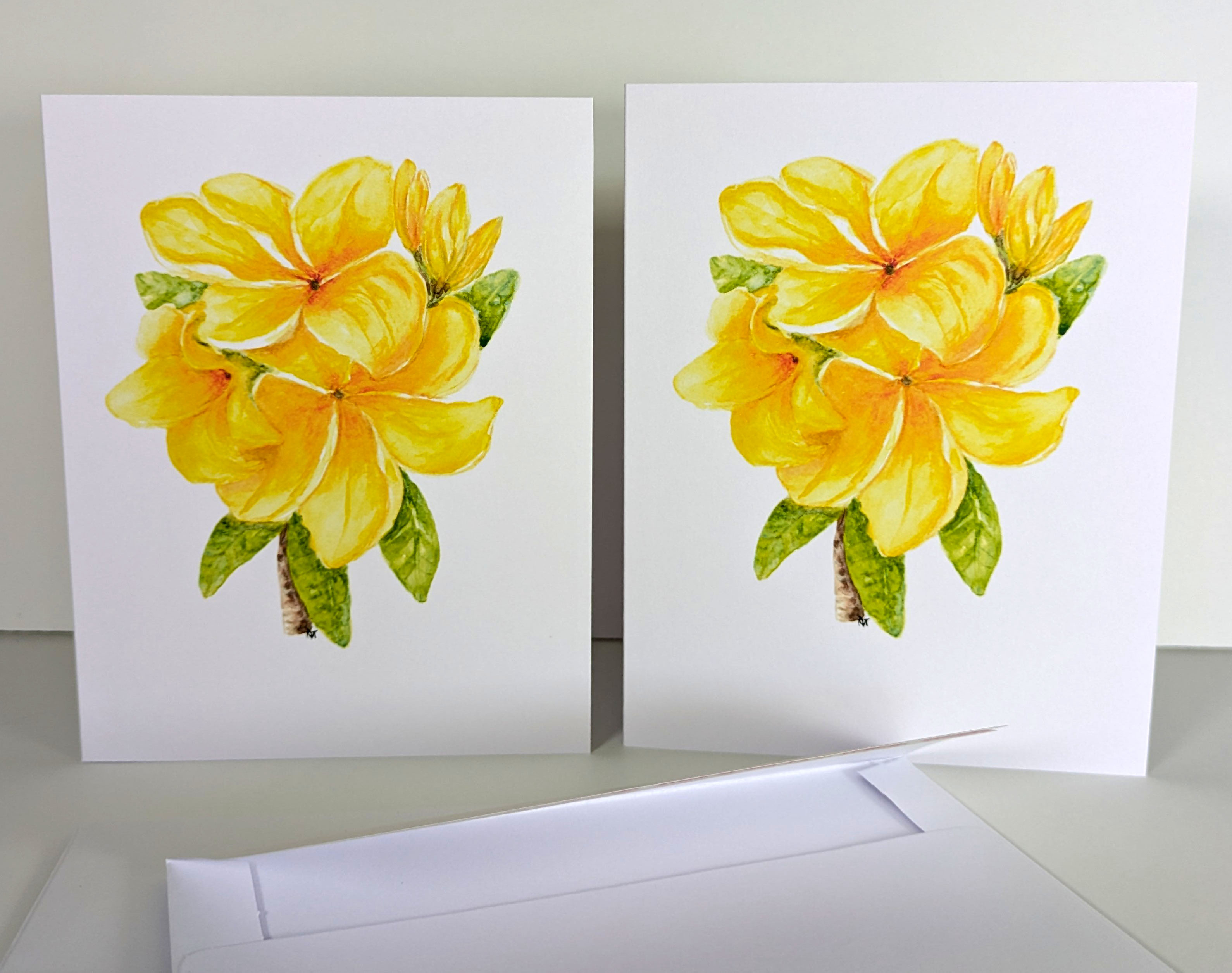 Plumeria flower in watercolor greeting card