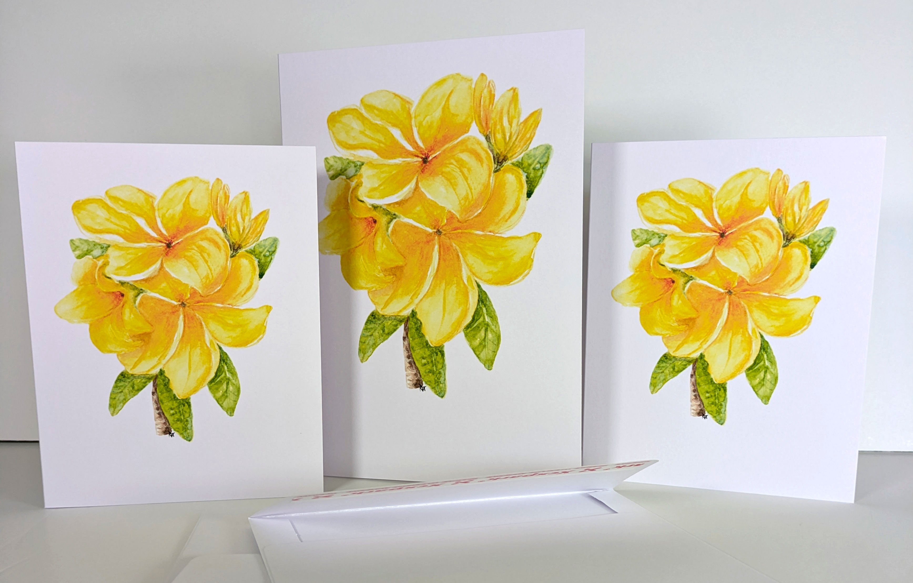 Plumeria flower in watercolor greeting card