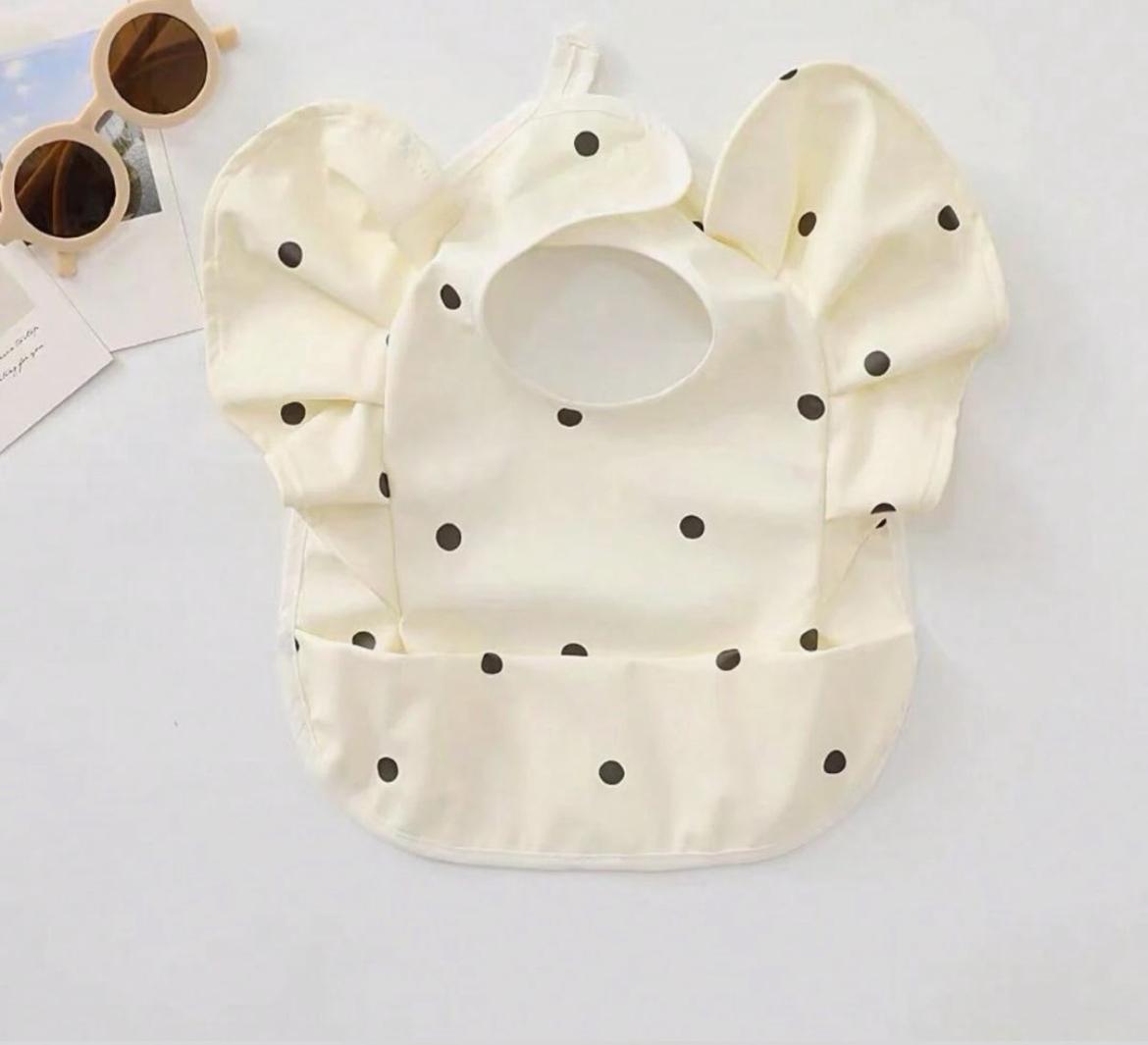 Babero Impermeable. La Elegancia a la Hora de Comer.