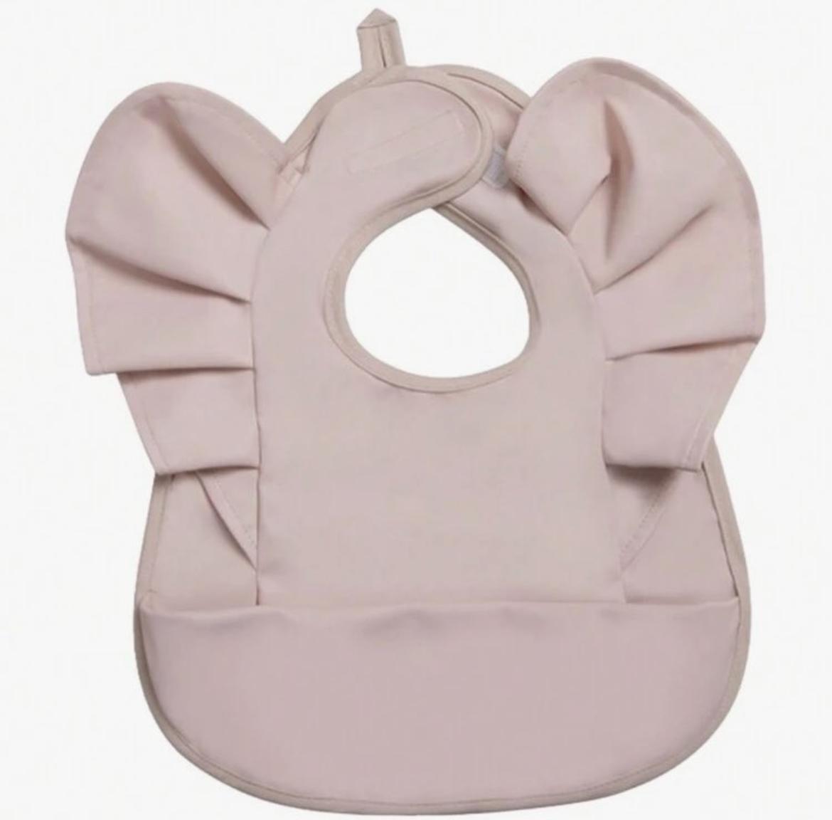 Babero Impermeable. La Elegancia a la Hora de Comer.