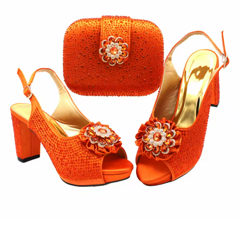 Elegant Orange High-Heel Sandals with Matching Clutch