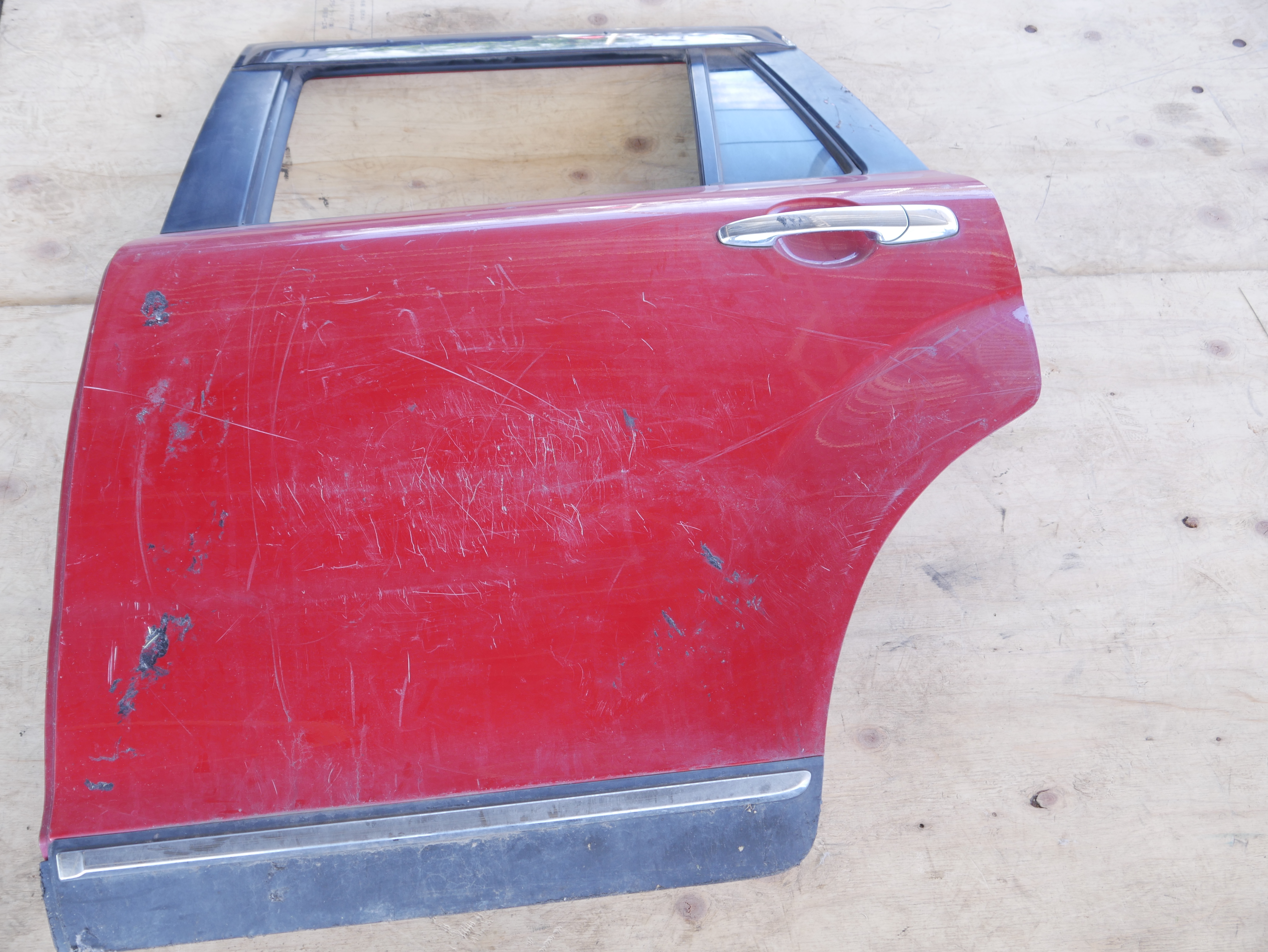 Mazda Verissa Rear Door