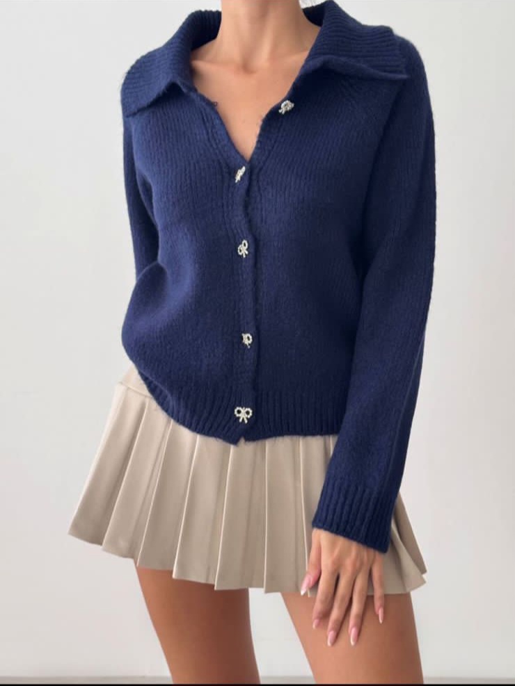 Cardigan with ribbon buttoms