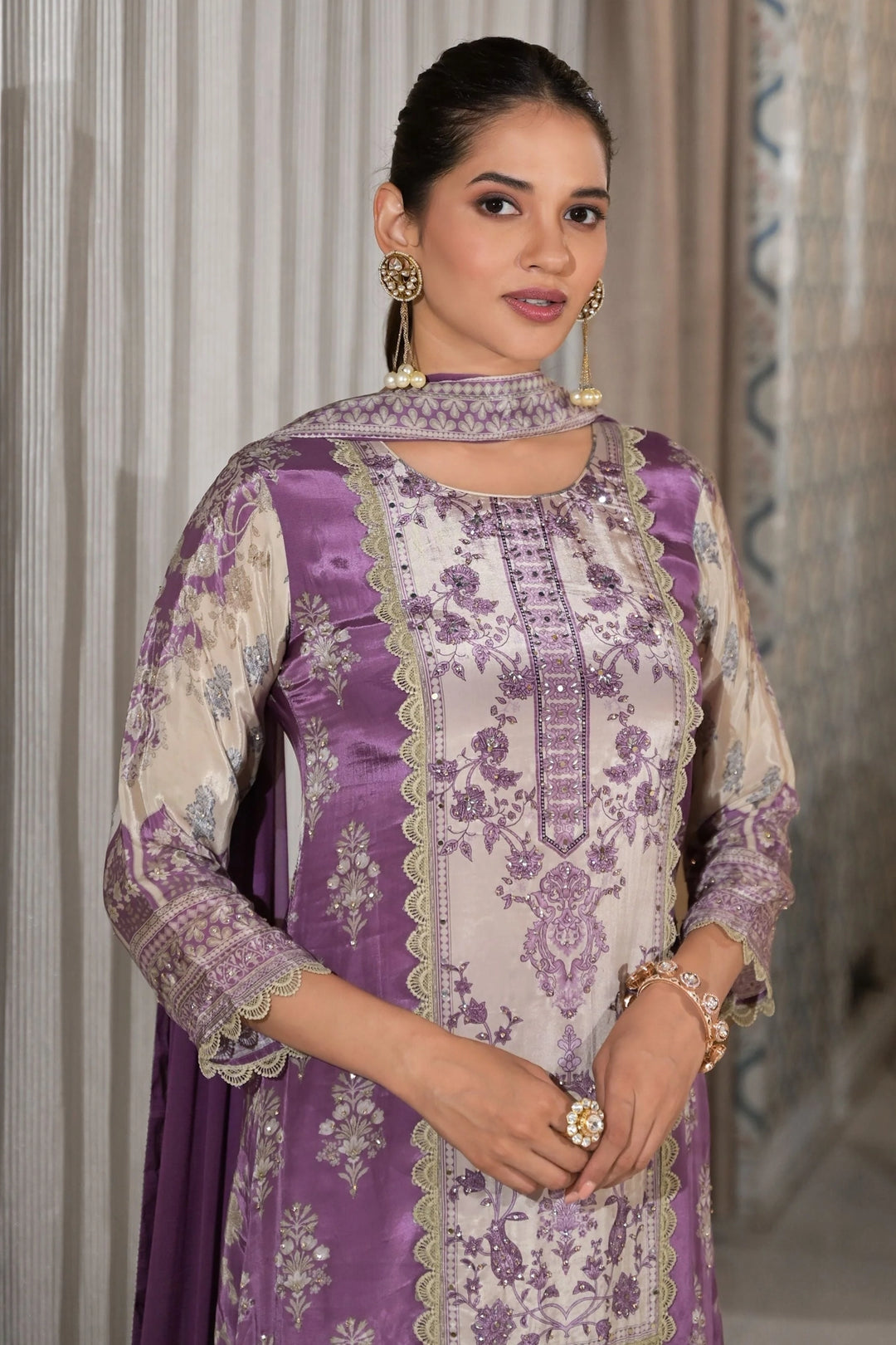 Bold, bright, and beautifully traditional Purple Floral Embroidered C CUT SUTI SET