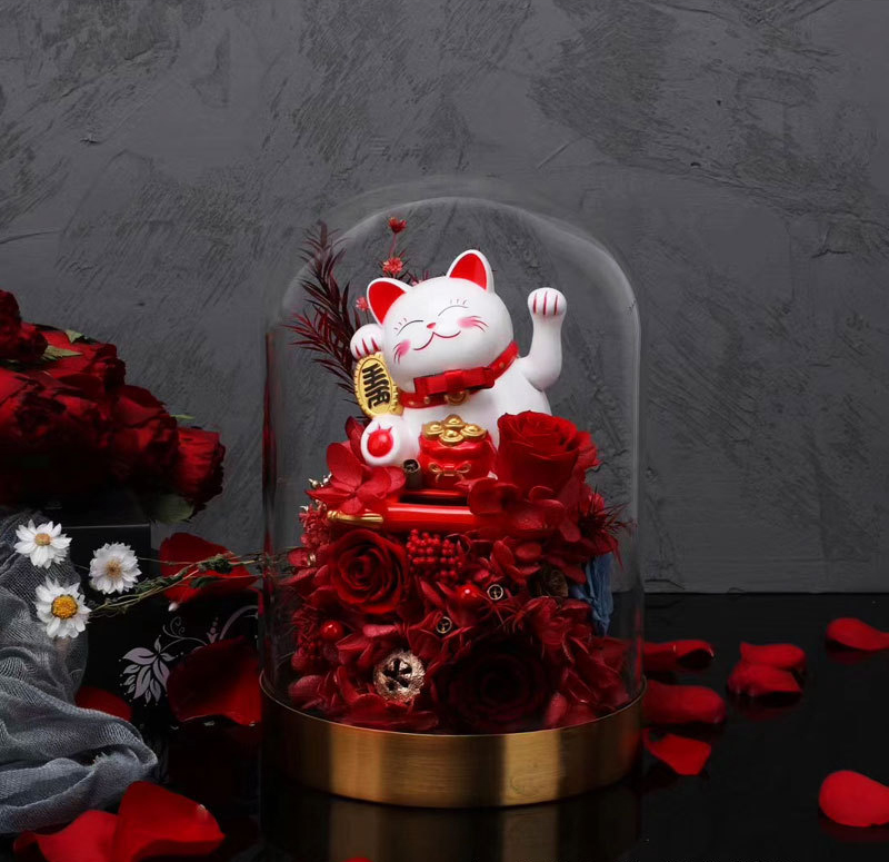 Lucky cat in glass