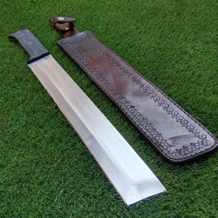 Fully hand_crafted  brisket knife with leather sheath.