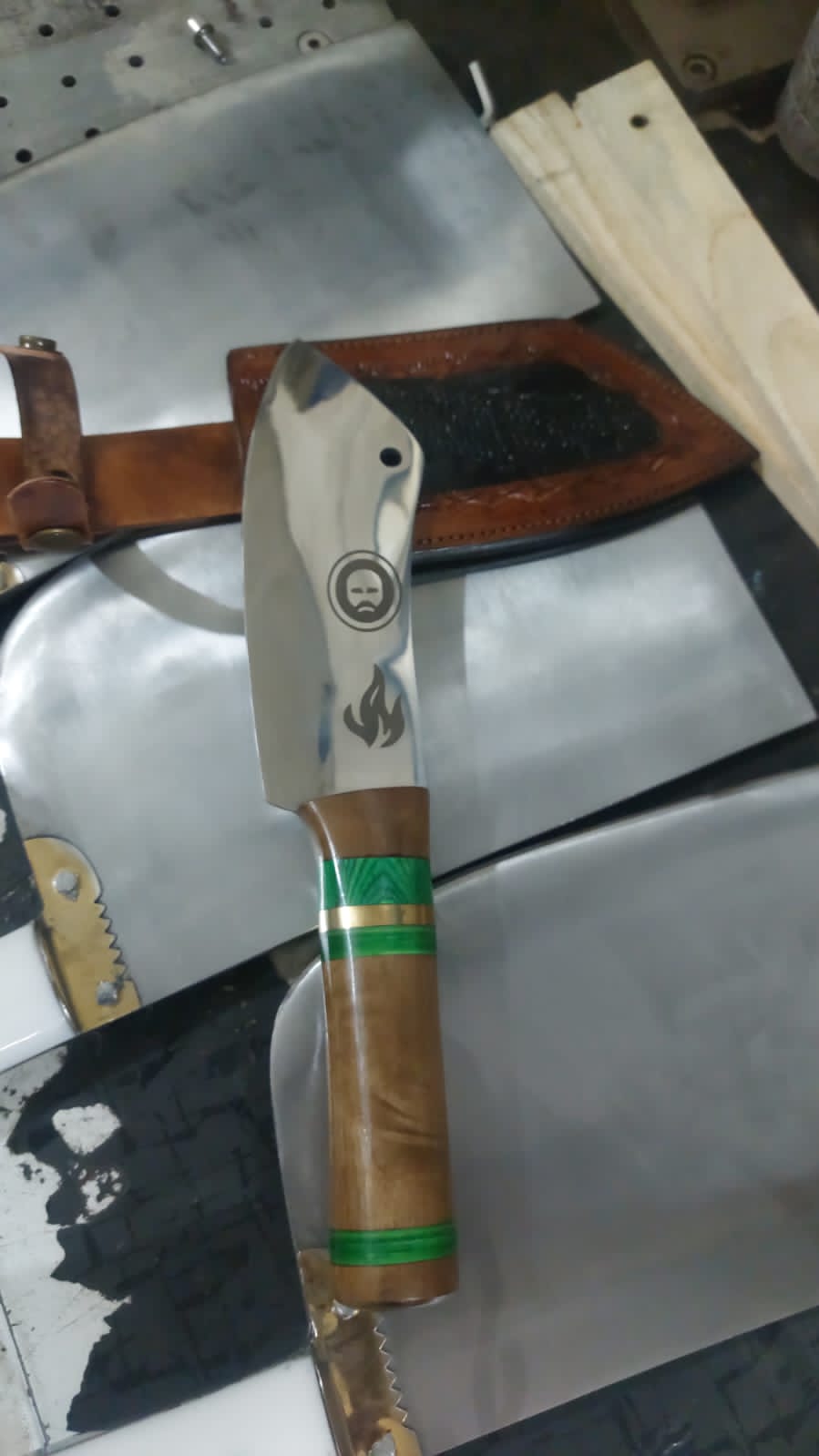 Fully hand_crafted  brisket knife with leather sheath.