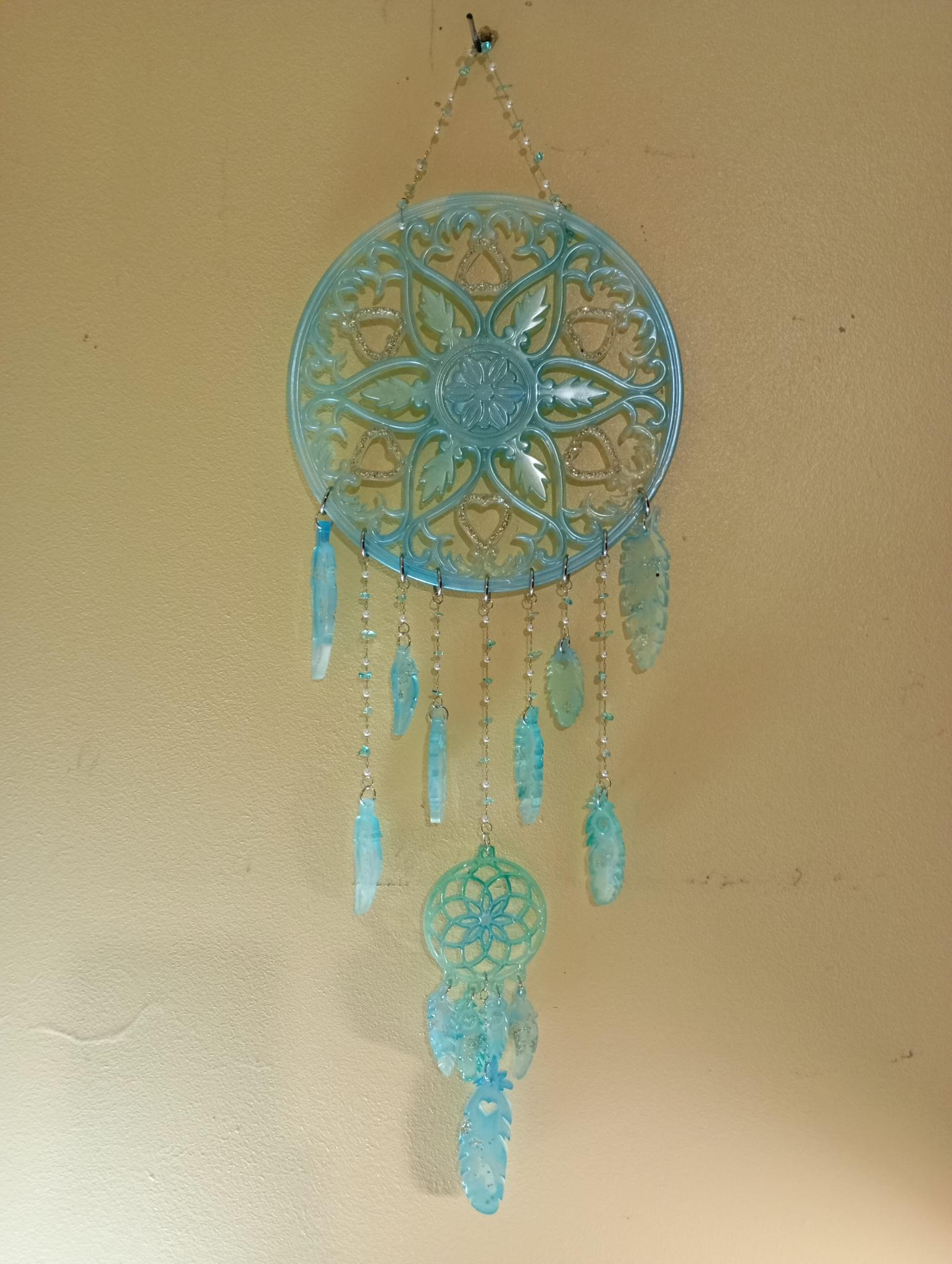 Attrape-rêves turquoise en résine