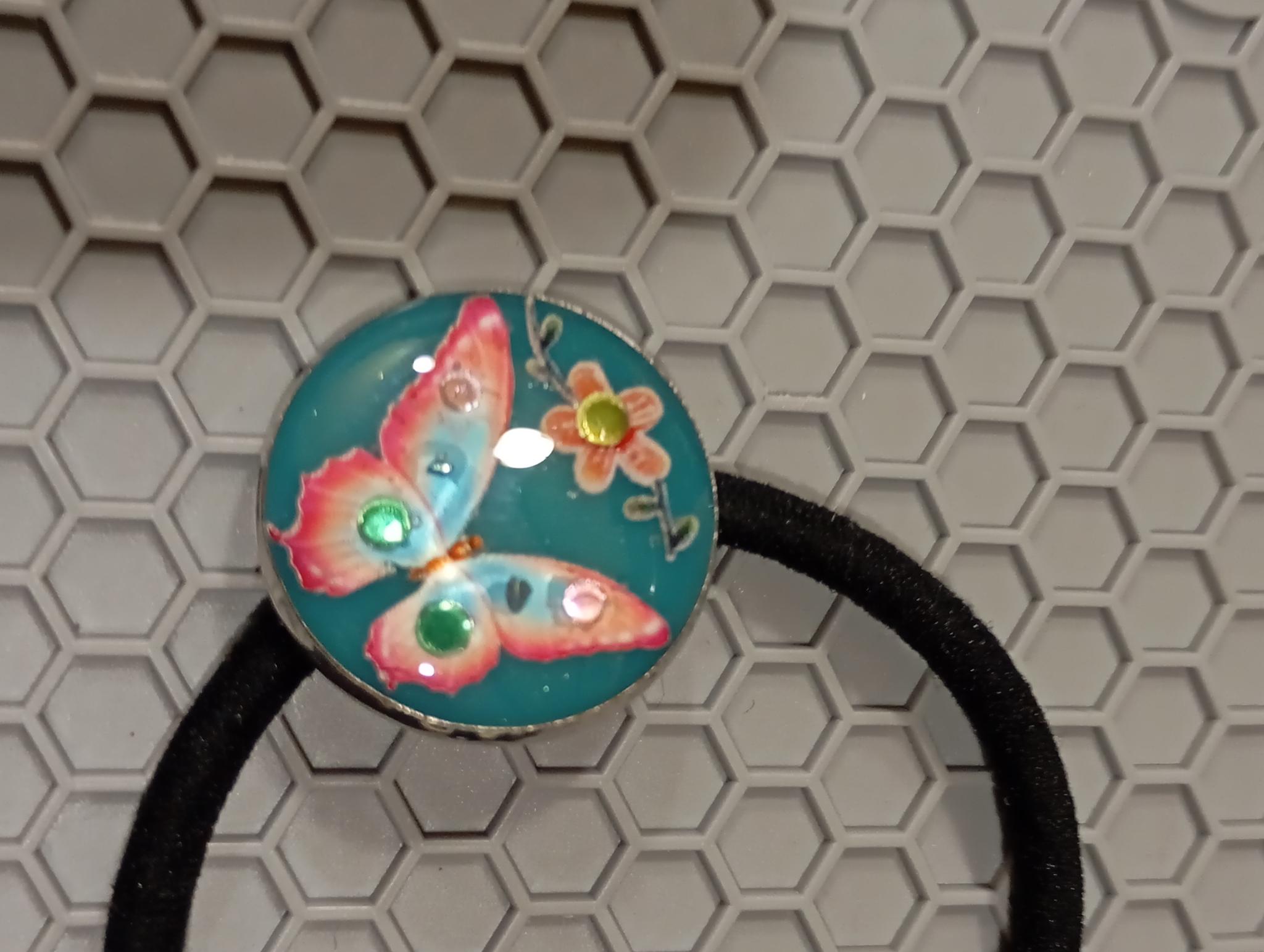 Élastique à cheveux papillon