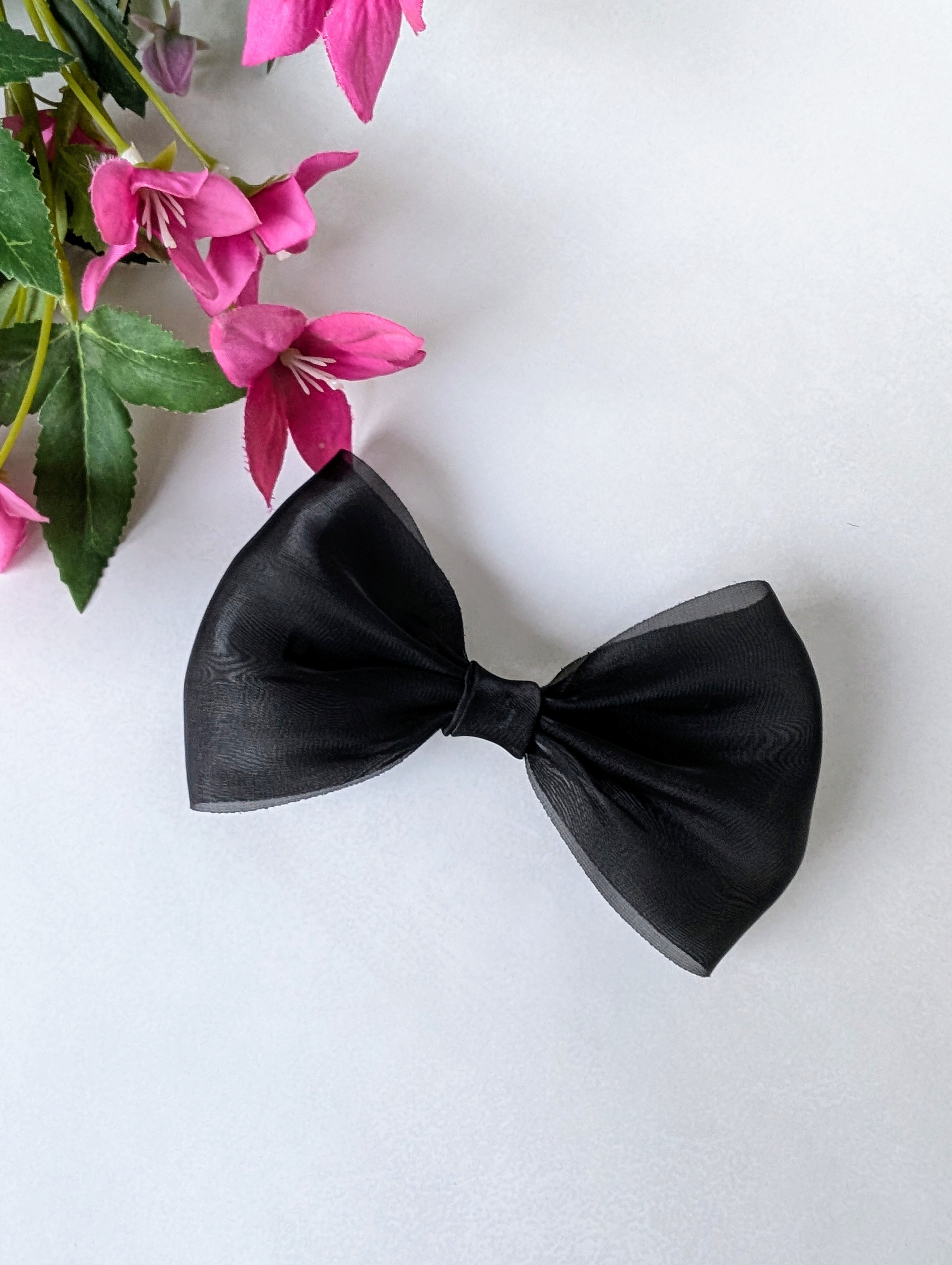 Hårspenne med sløyfe