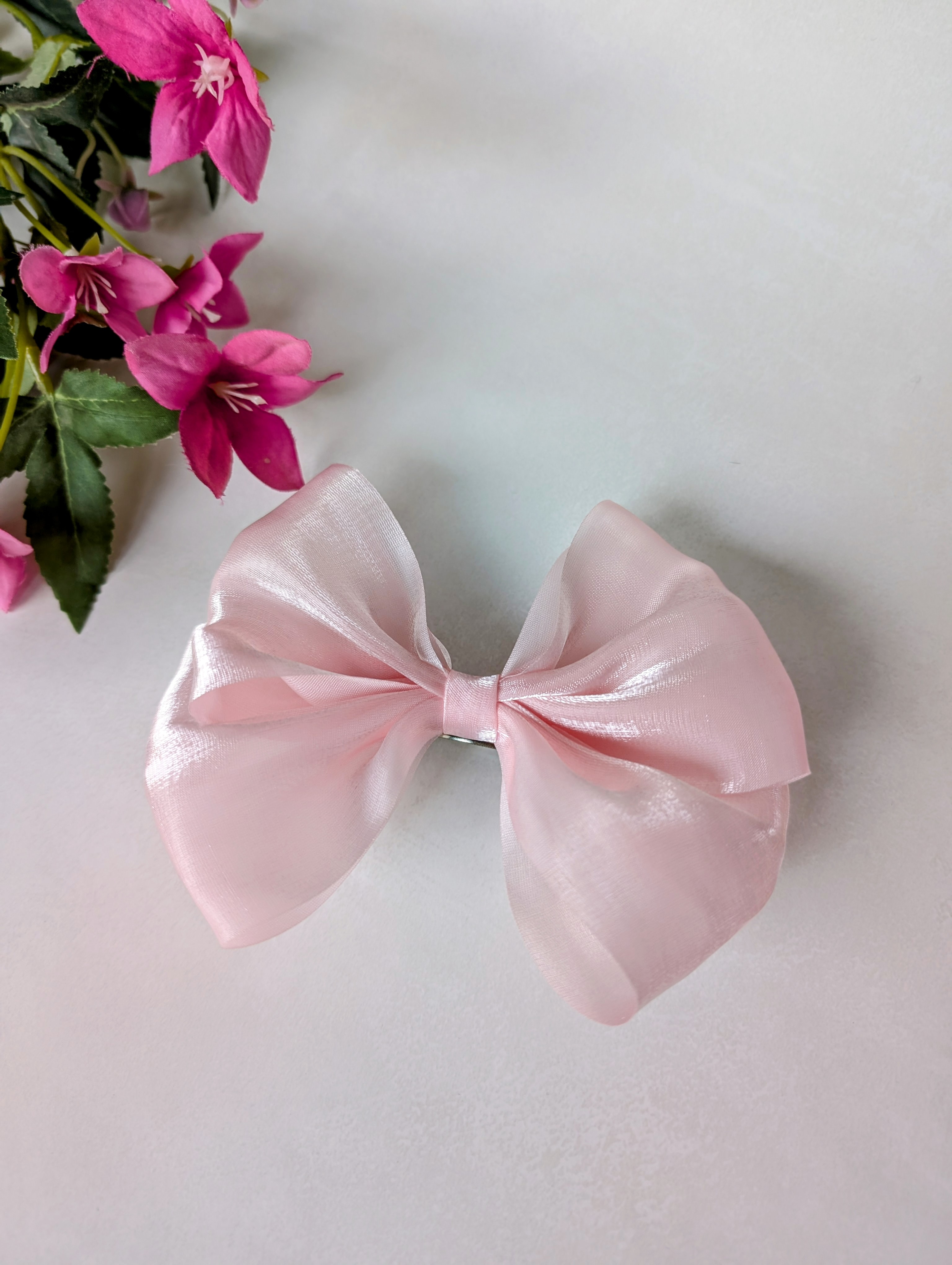 Hårspenne med sløyfe