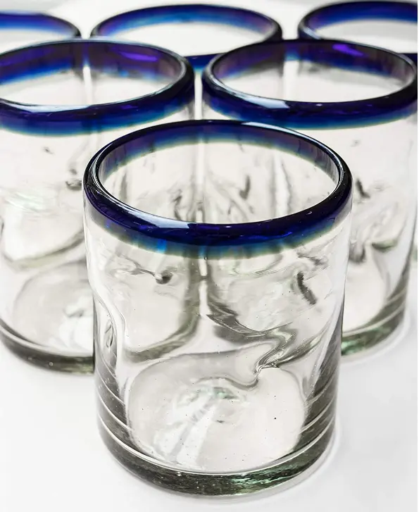 Set of six blue rimmed shot glasses