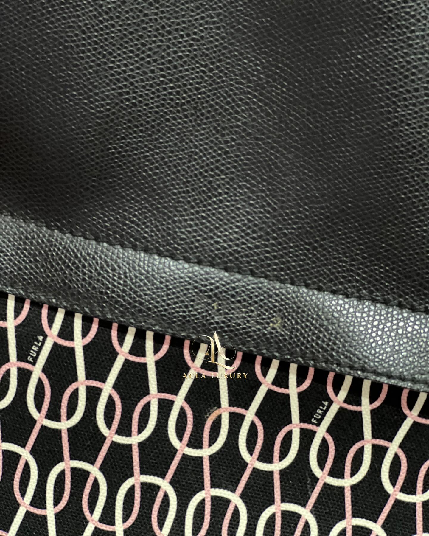 Furla Leather Paneled Printed Canvas Backpack in Black 