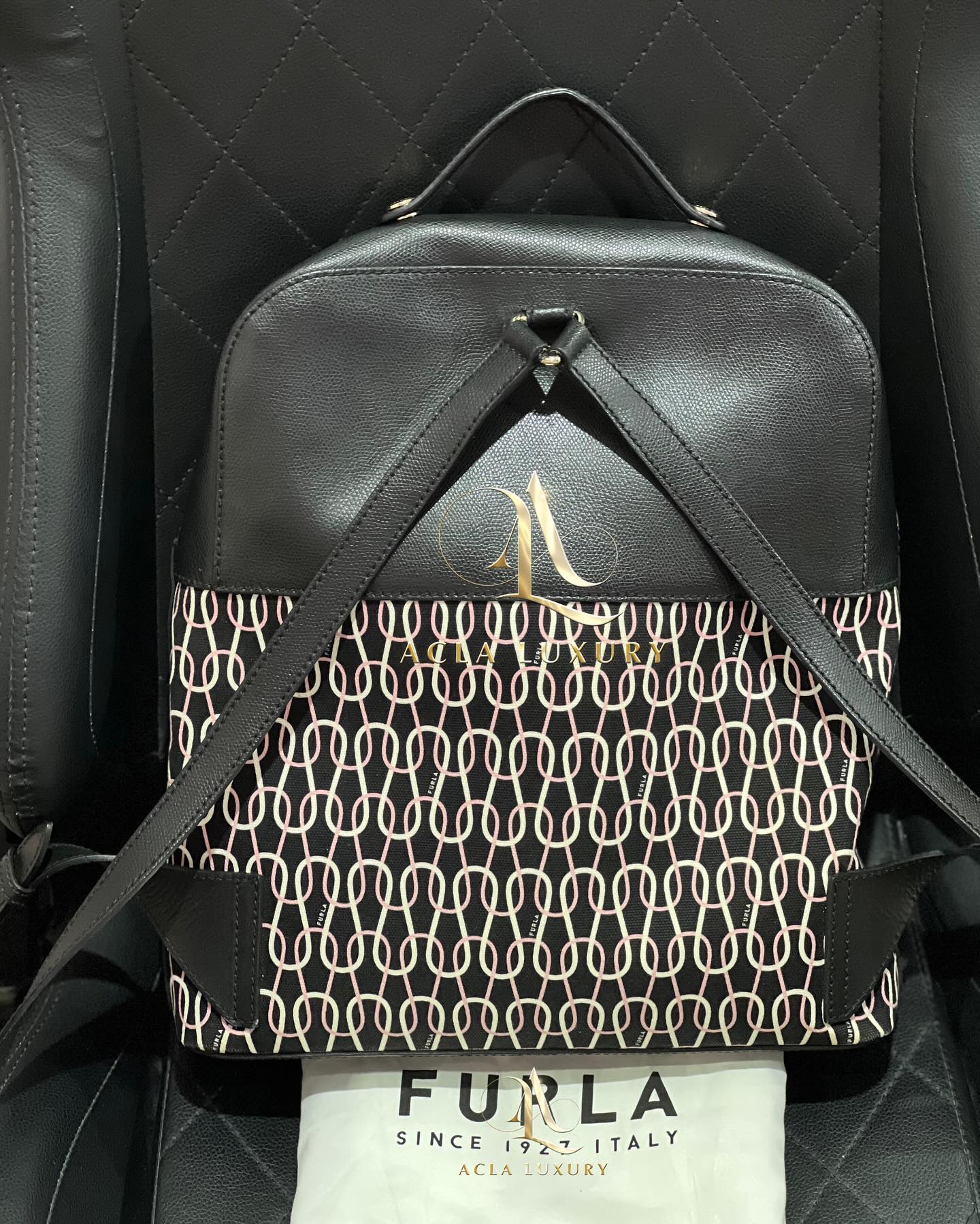 Furla Leather Paneled Printed Canvas Backpack in Black 
