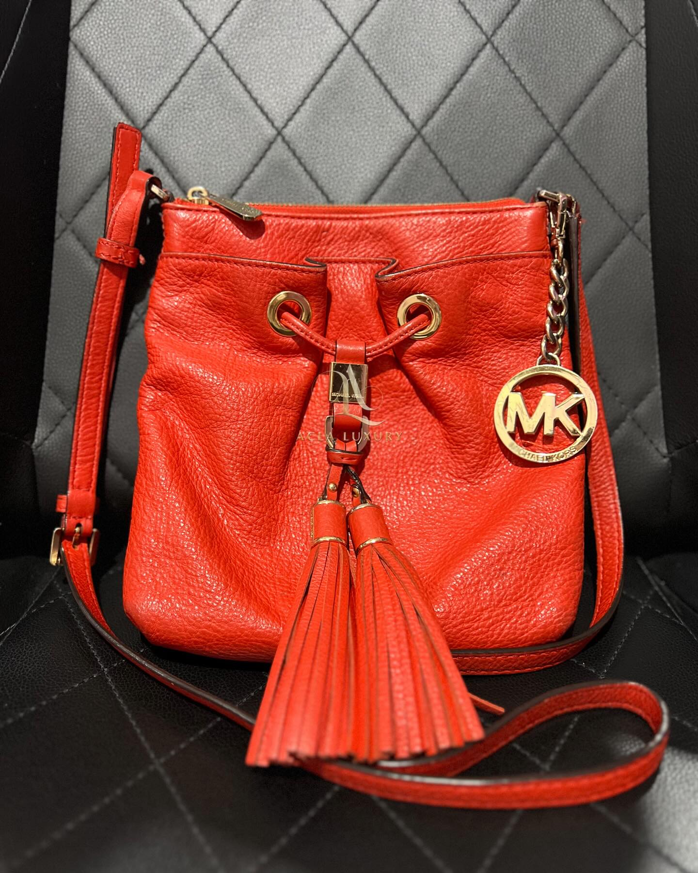 Michael Kors MK Orange Leather Bucket Purse Pebbled Crossbody Gold Chain Detail Bag