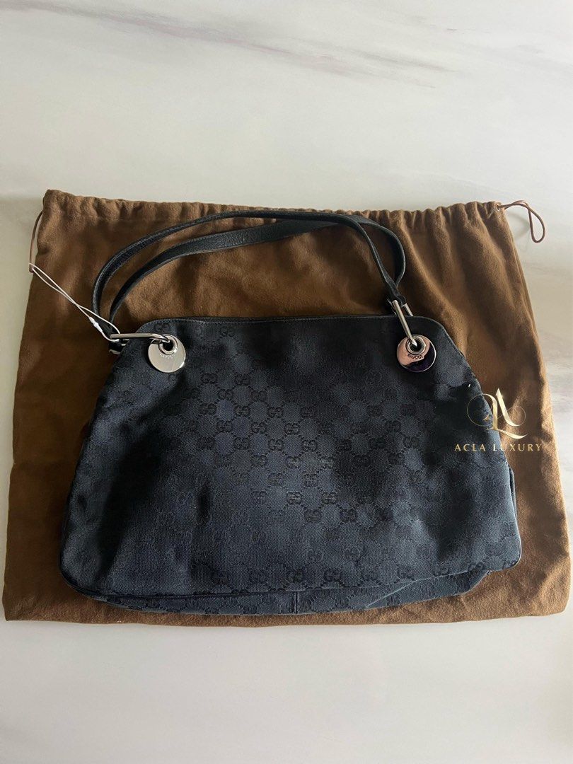 Medium GG Gucci Canvas Eclipse shoulder bag