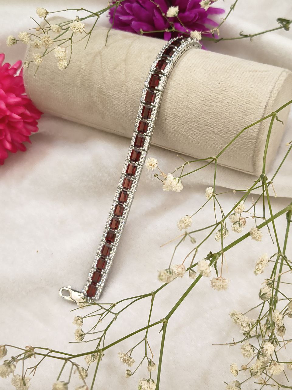 Elegant Diamond Bracelet with Red Garnets
