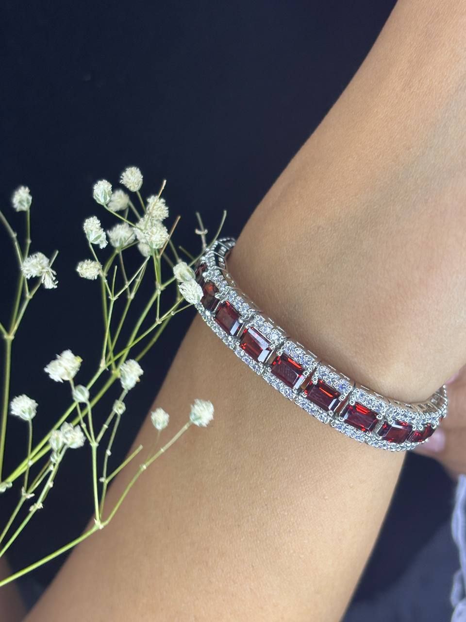 Elegant Diamond Bracelet with Red Garnets