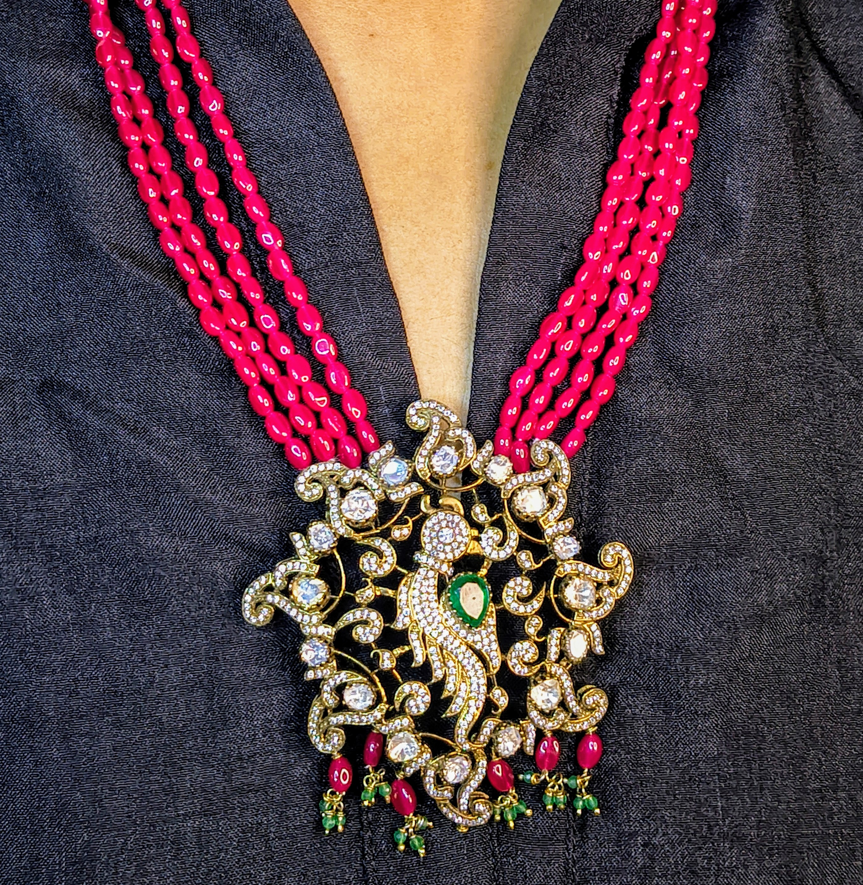 Elegant Beaded Necklace with Intricate Pendant