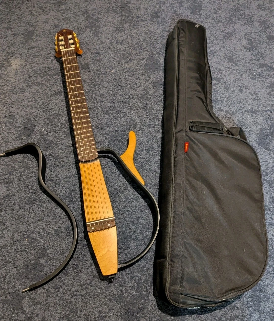 Yamaha SLG200N silent guitar nylon travel together with original gig bag.