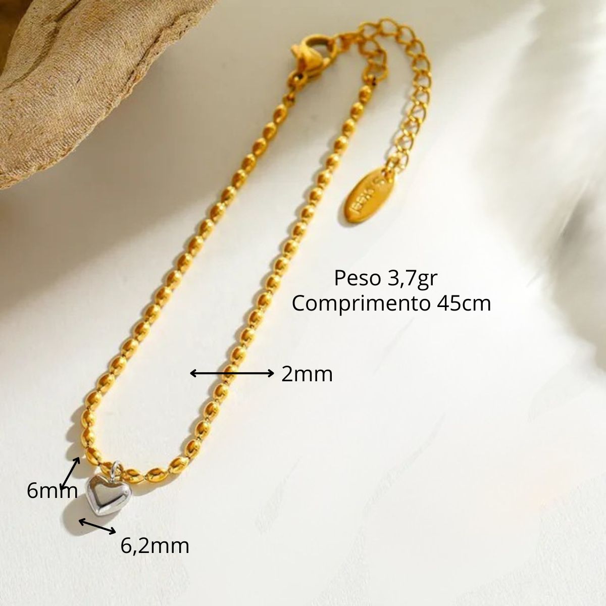 Colar de aço com banho de ouro com pingente de coração