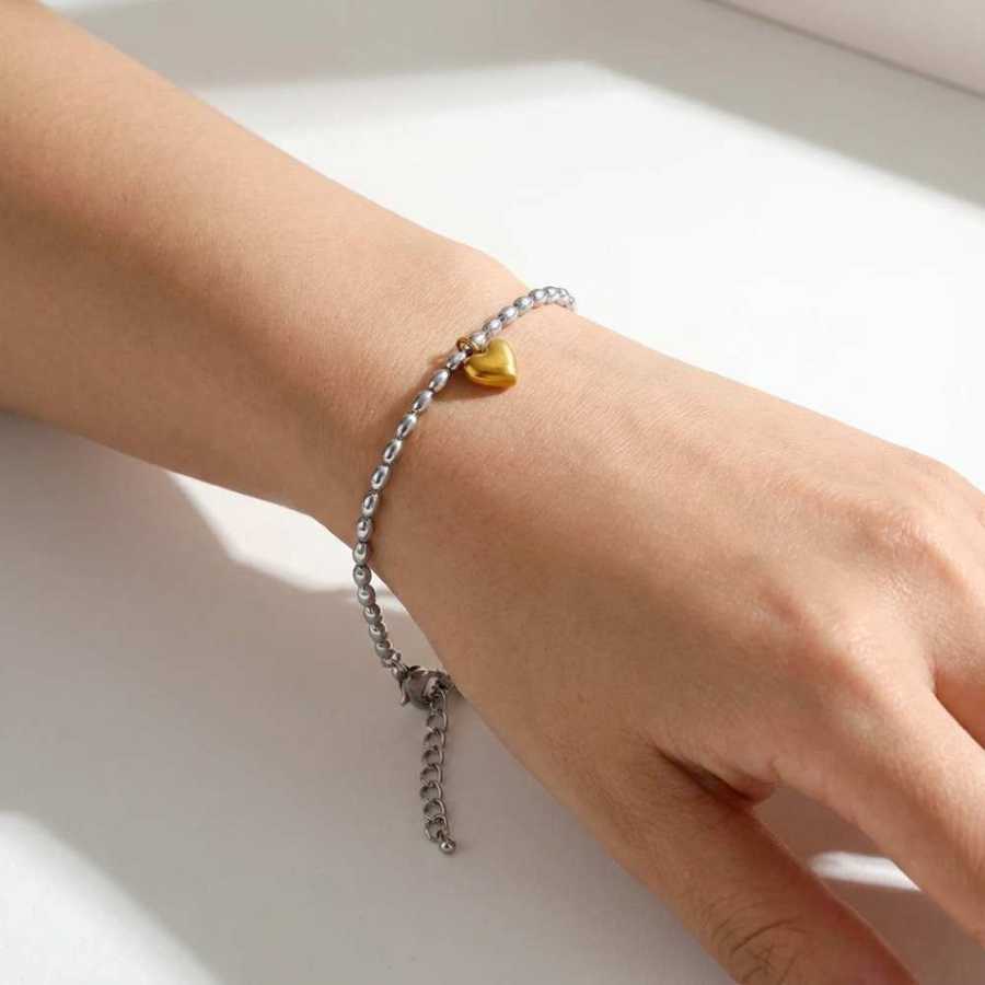 Pulseira Prata com Pingente de Coração Dourado