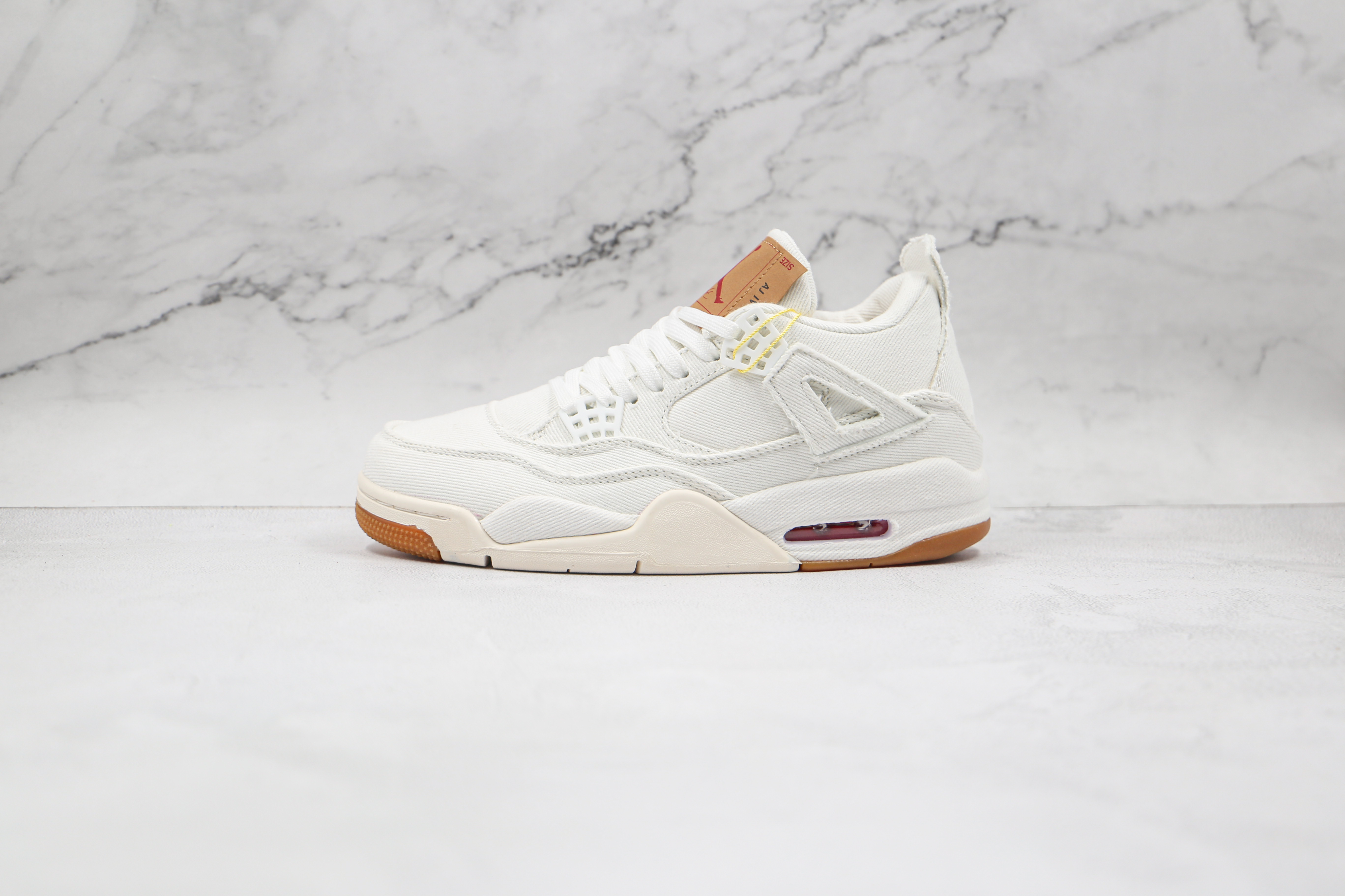 Levi x Air Jordan 4 in White 
