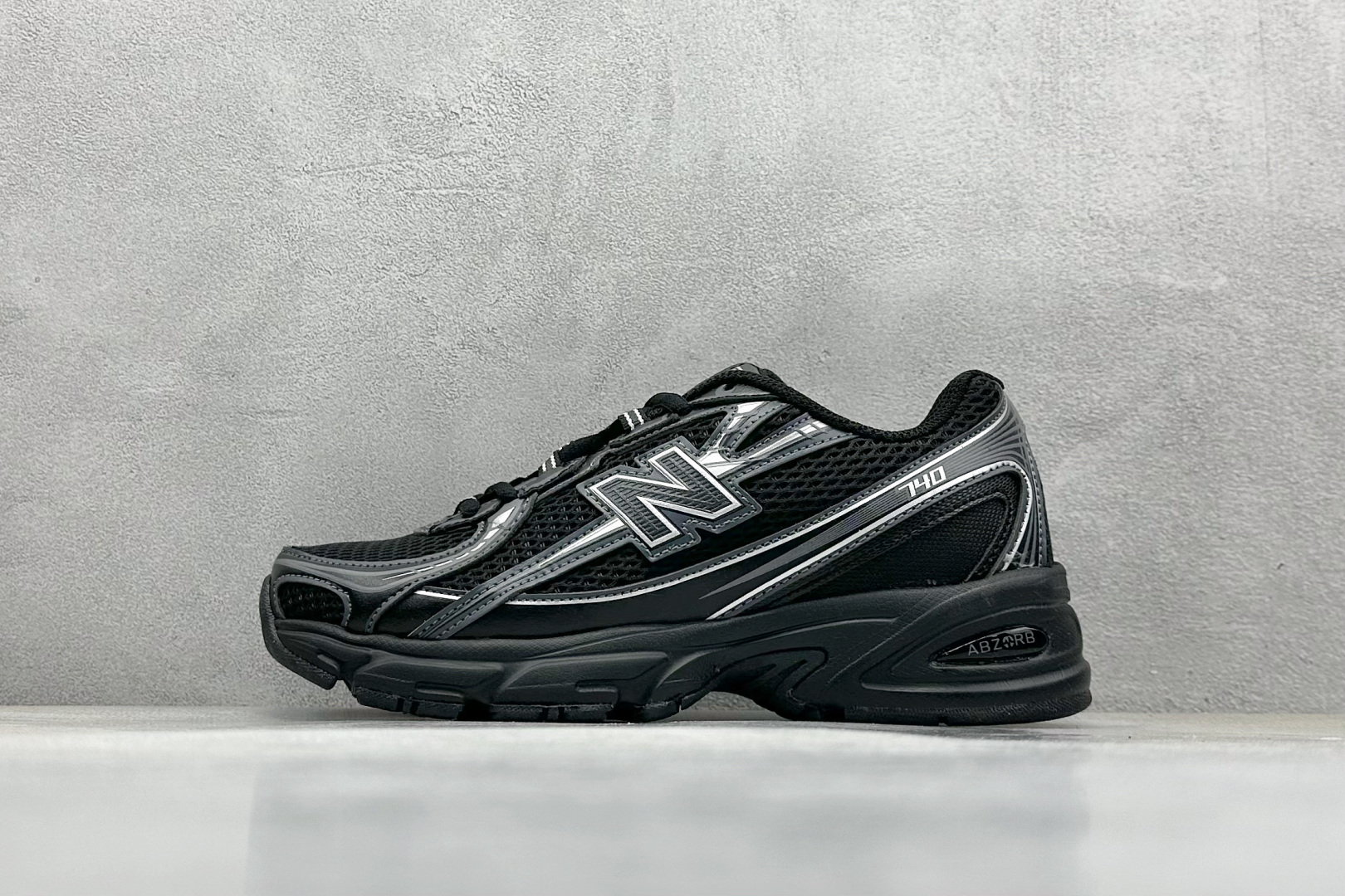 New Balance 740 'Black with silver metallic'