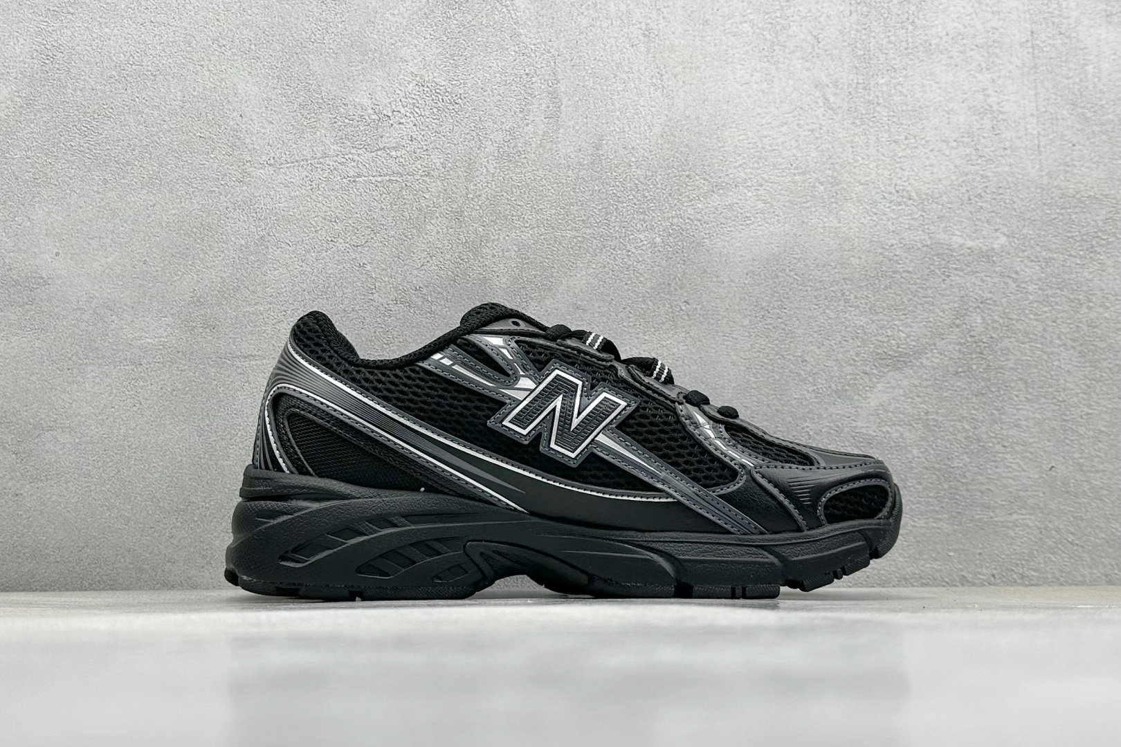 New Balance 740 'Black with silver metallic'