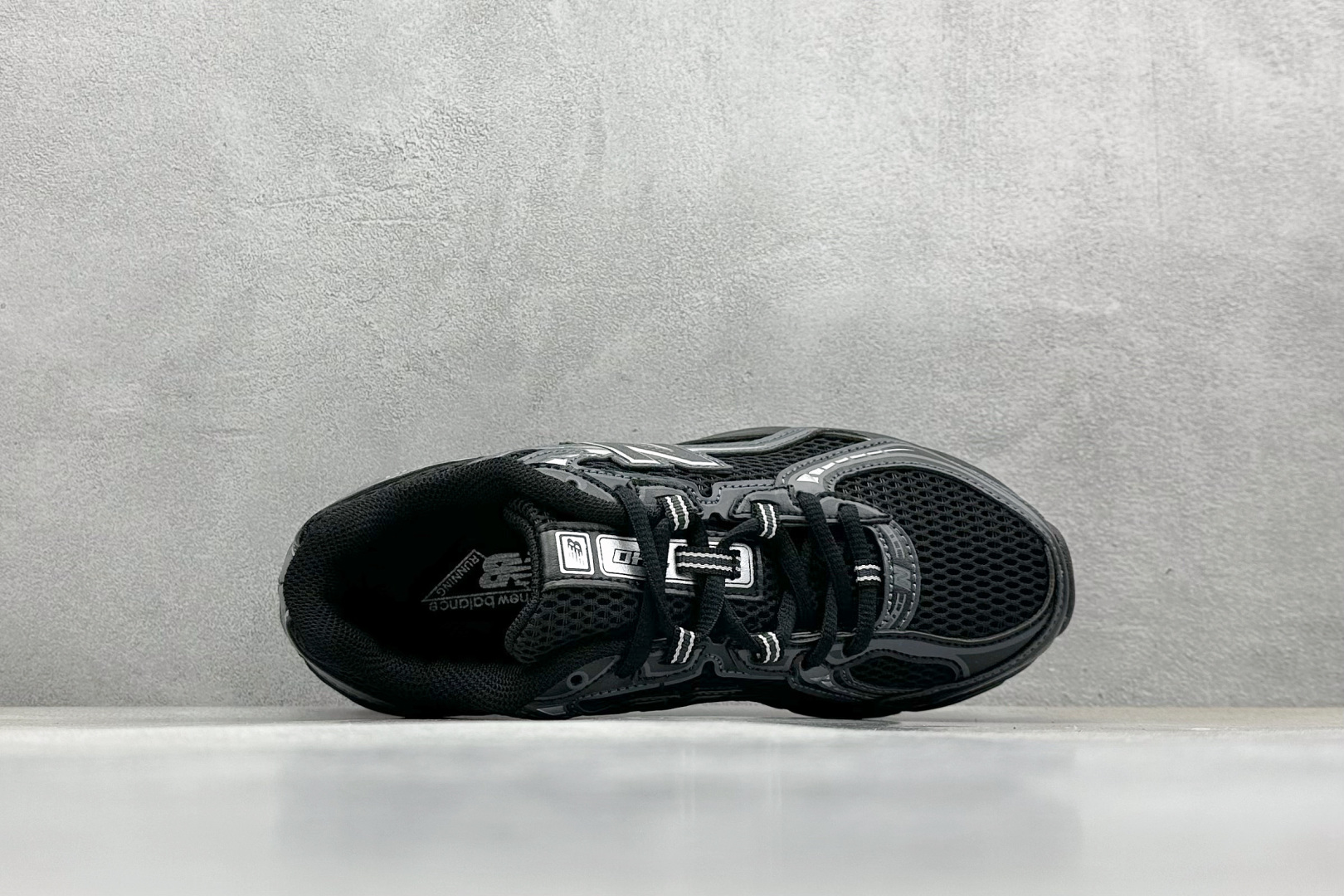 New Balance 740 'Black with silver metallic'