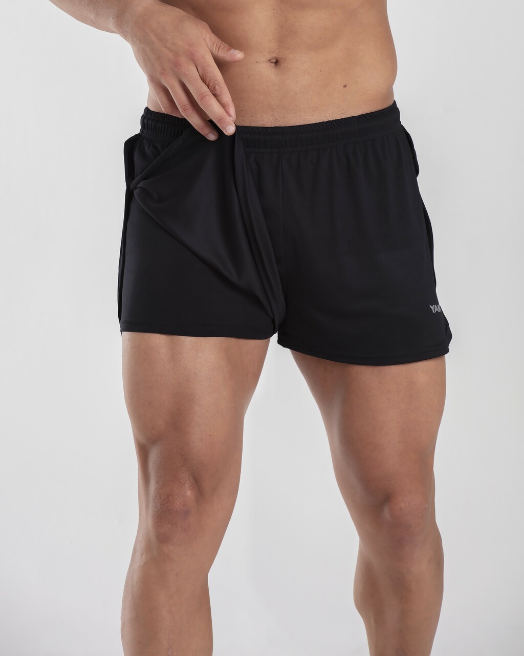 Short con calza Yakka unisex