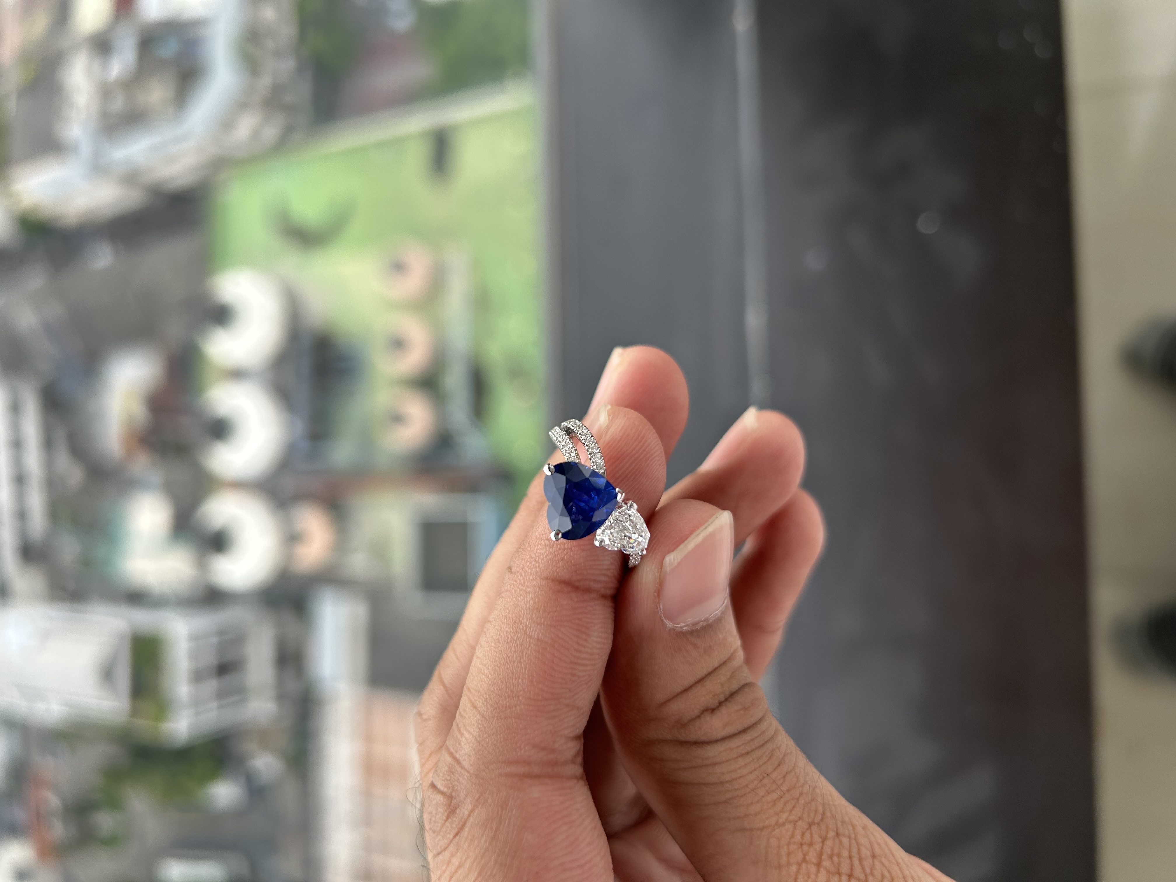 Heart-shaped blue sapphire and diamond ring