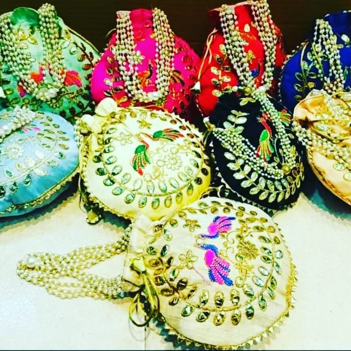 Embroidered Leaf-Peacock Design Potli Bags