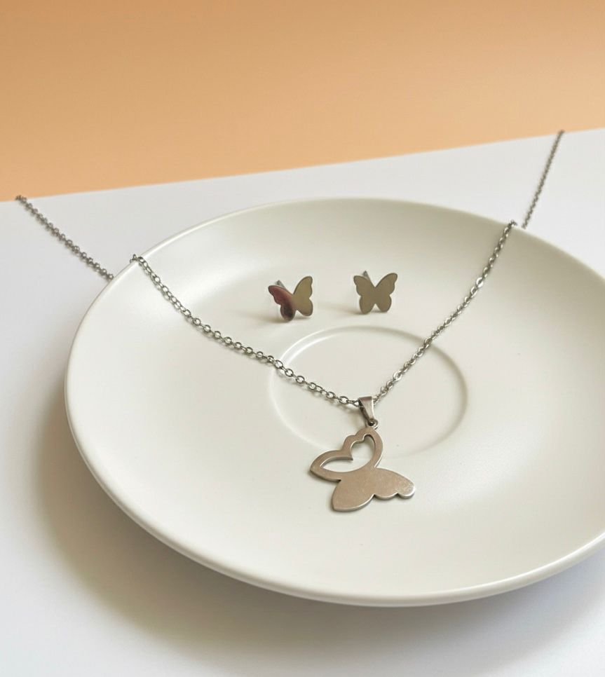 Juego de collar y aretes mariposa