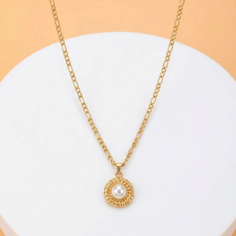 Collar dorado con perla
