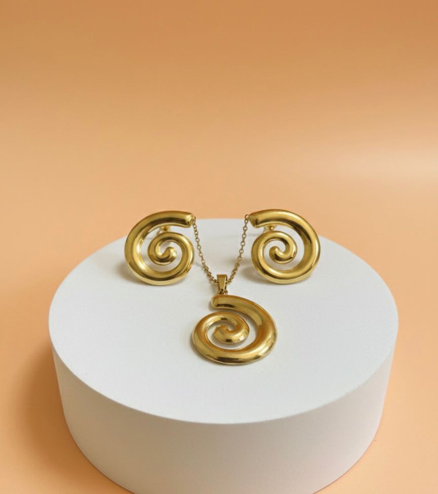 Set de joyería espiral dorado