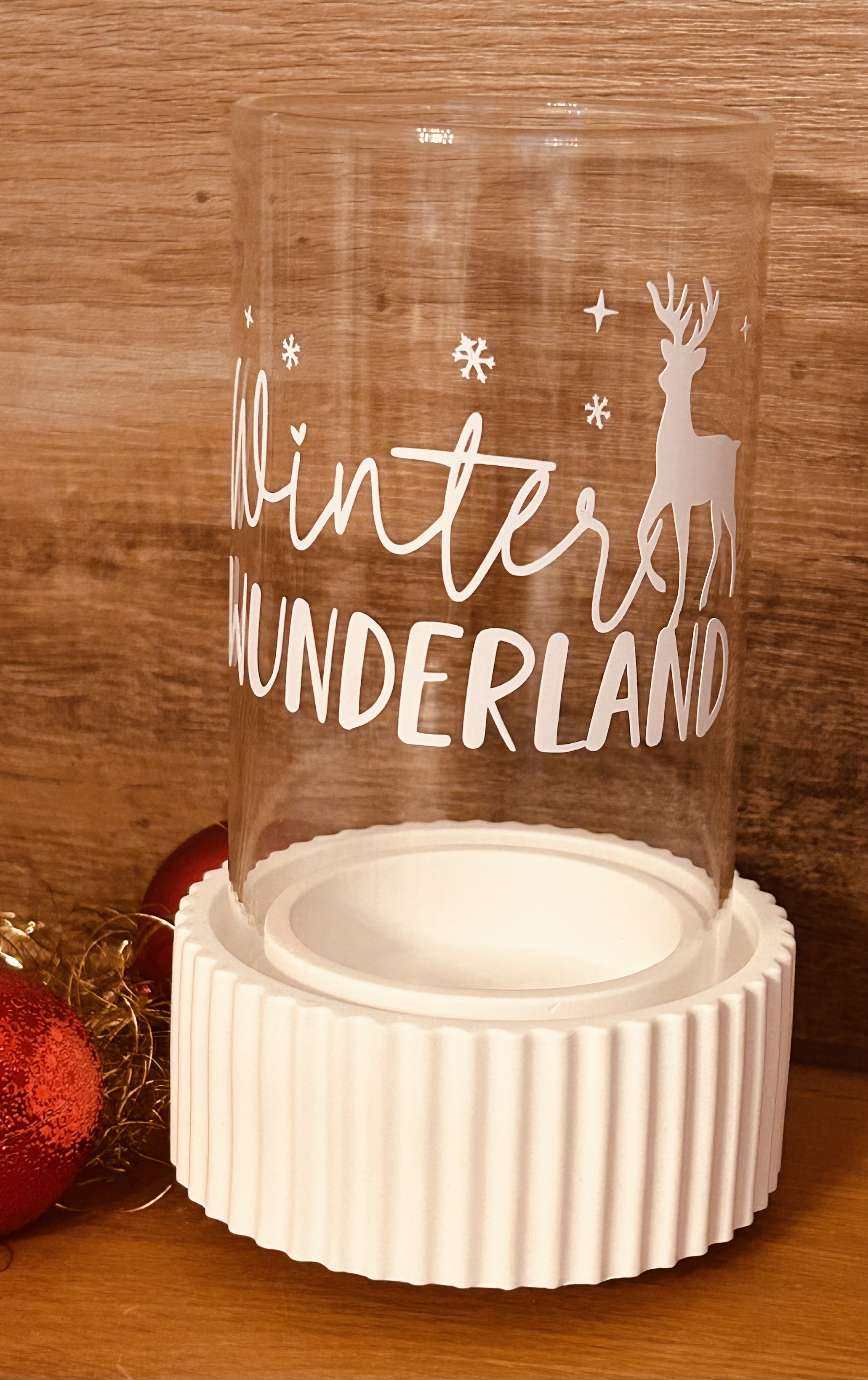 Teelichthalter mit wechselbaren Motivglas